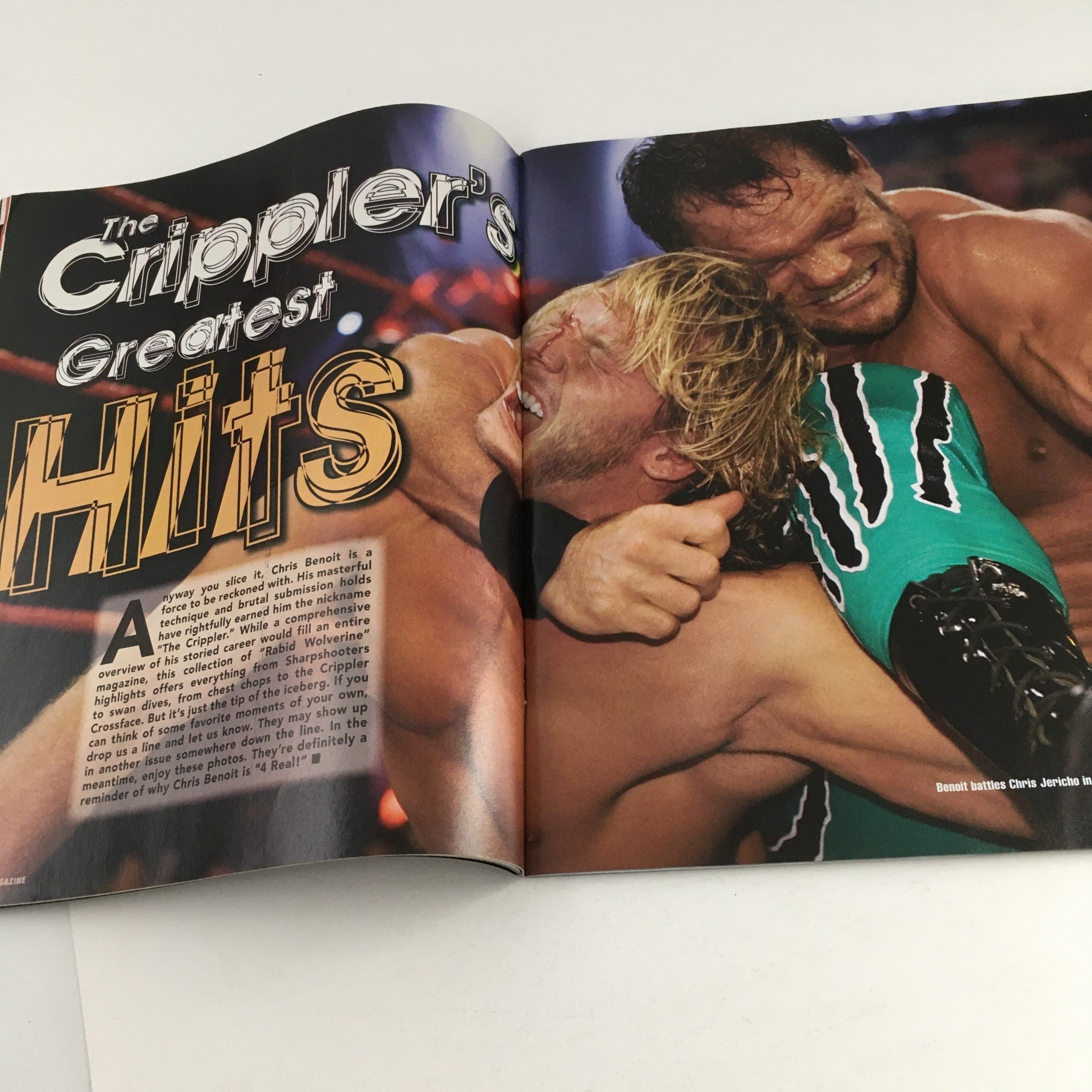 Inside the WWE Raw Magazine May 2005 showcasing an article about Chris Benoit titled 'The Crippler's Greatest Hits' with images of Benoit in action.