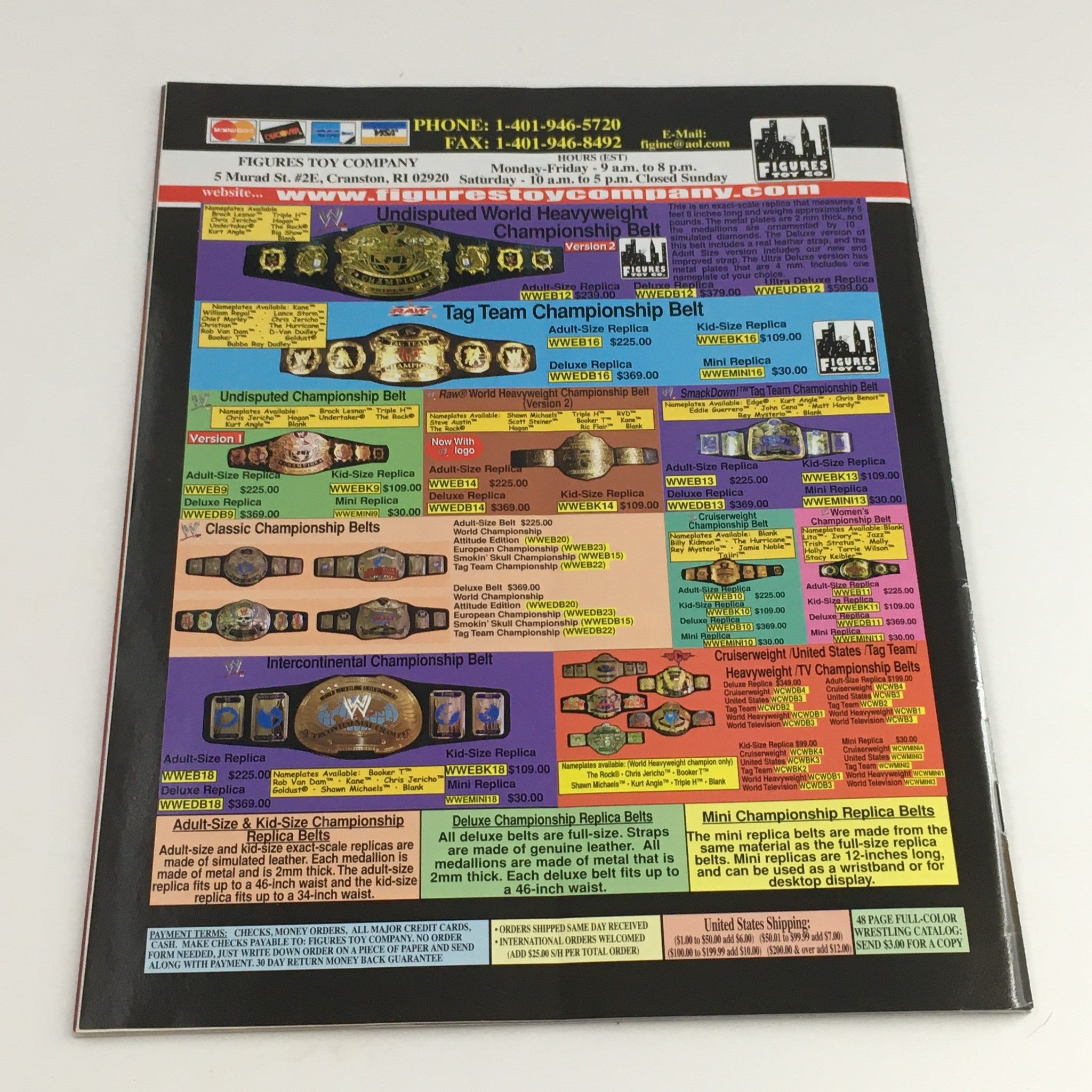 WWE Raw Magazine August 2003 back cover displaying various WWE championship belts, an essential piece for wrestling memorabilia enthusiasts.