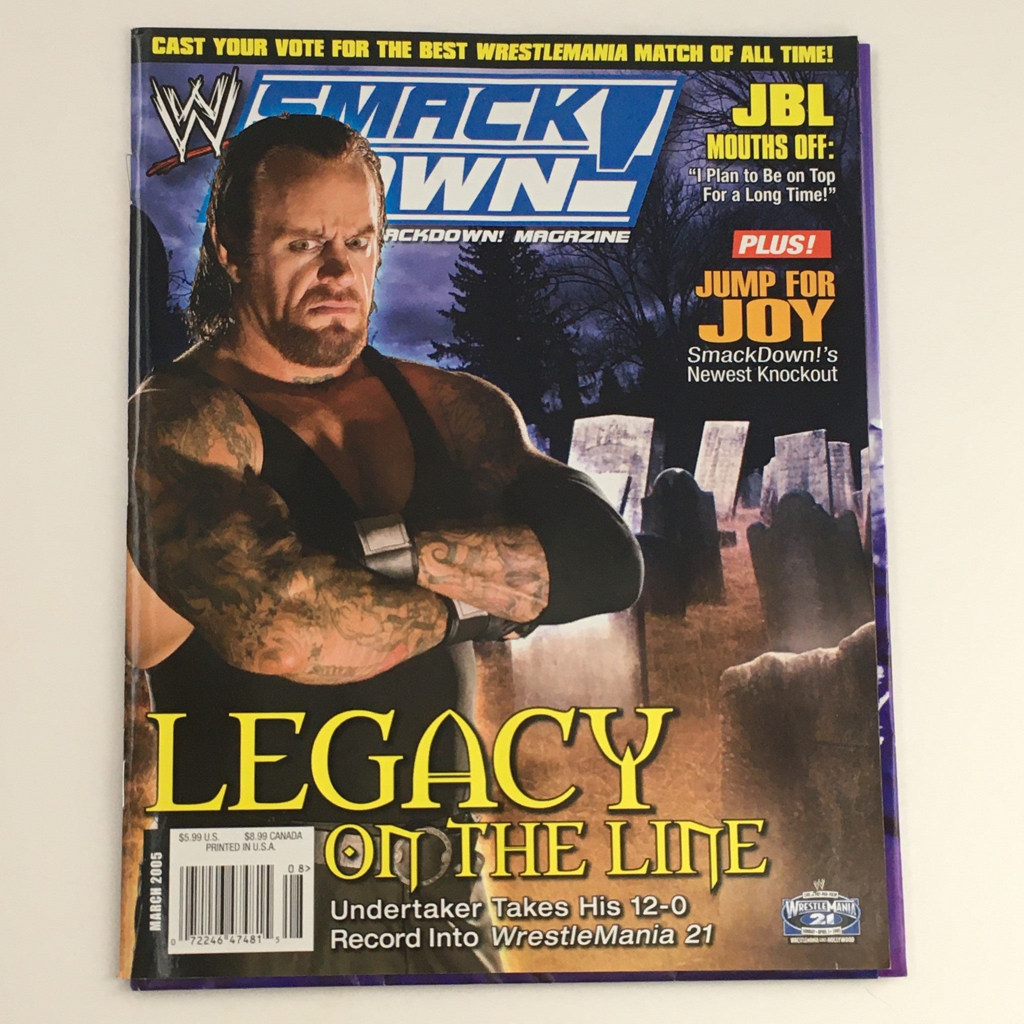WWE Raw Magazine March 2005 cover featuring The Undertaker, showcasing his powerful presence with a graveyard backdrop, highlighting the legacy of his wrestling career.