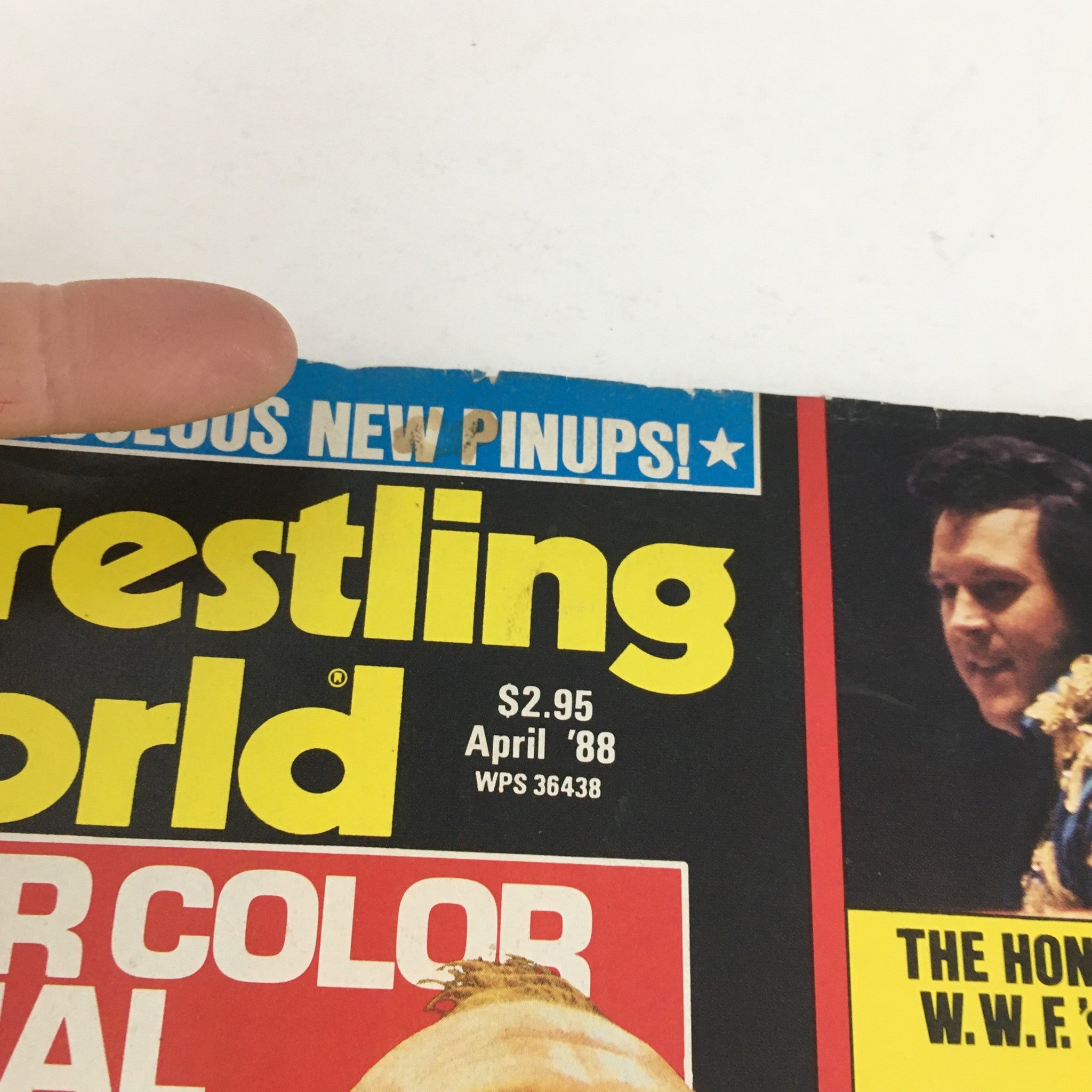 Close-up of the top corner of Wrestling World Magazine April 1988, showcasing the title and features of the magazine including Hulk Hogan and Honky Tonk Man.