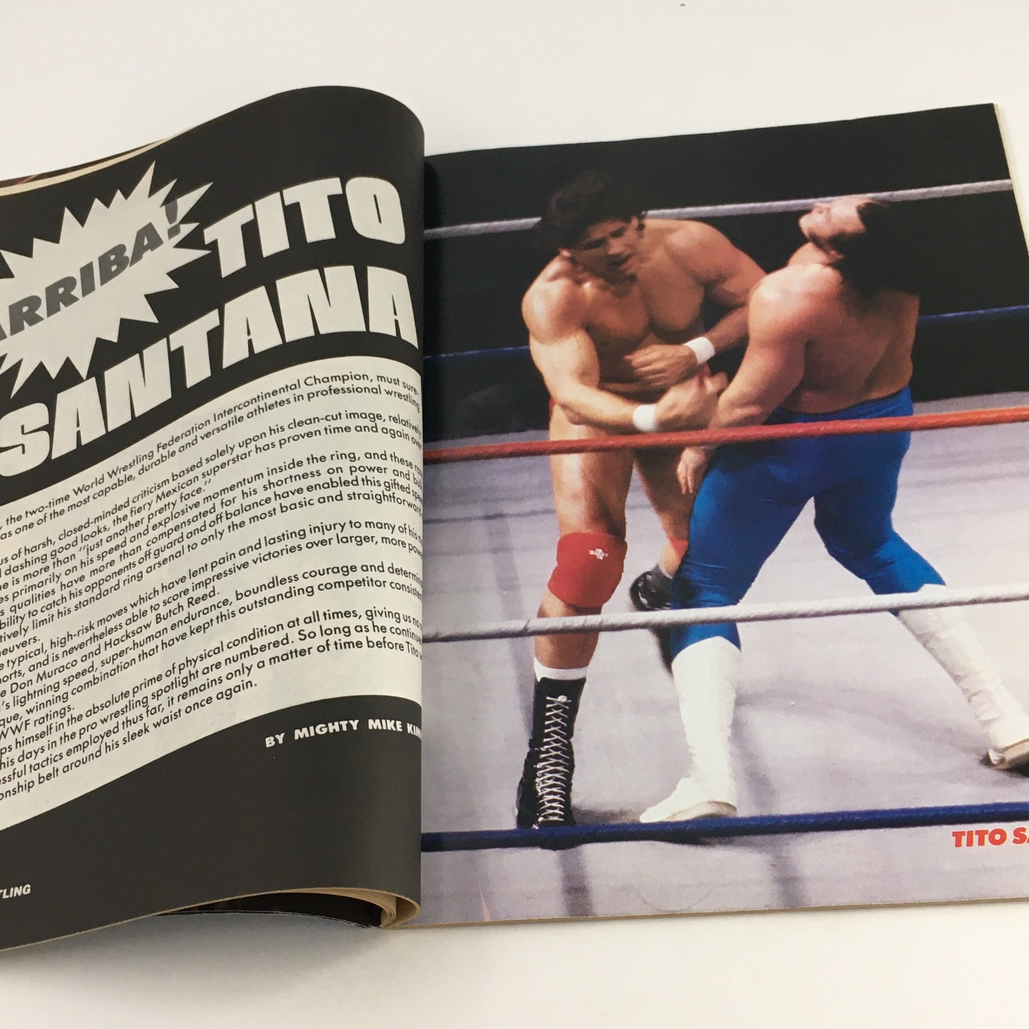 Inside page of the Gold Belt Wrestling Magazine from November 1987 featuring an article about wrestling champion Tito Santana, showcasing a wrestling match action scene.