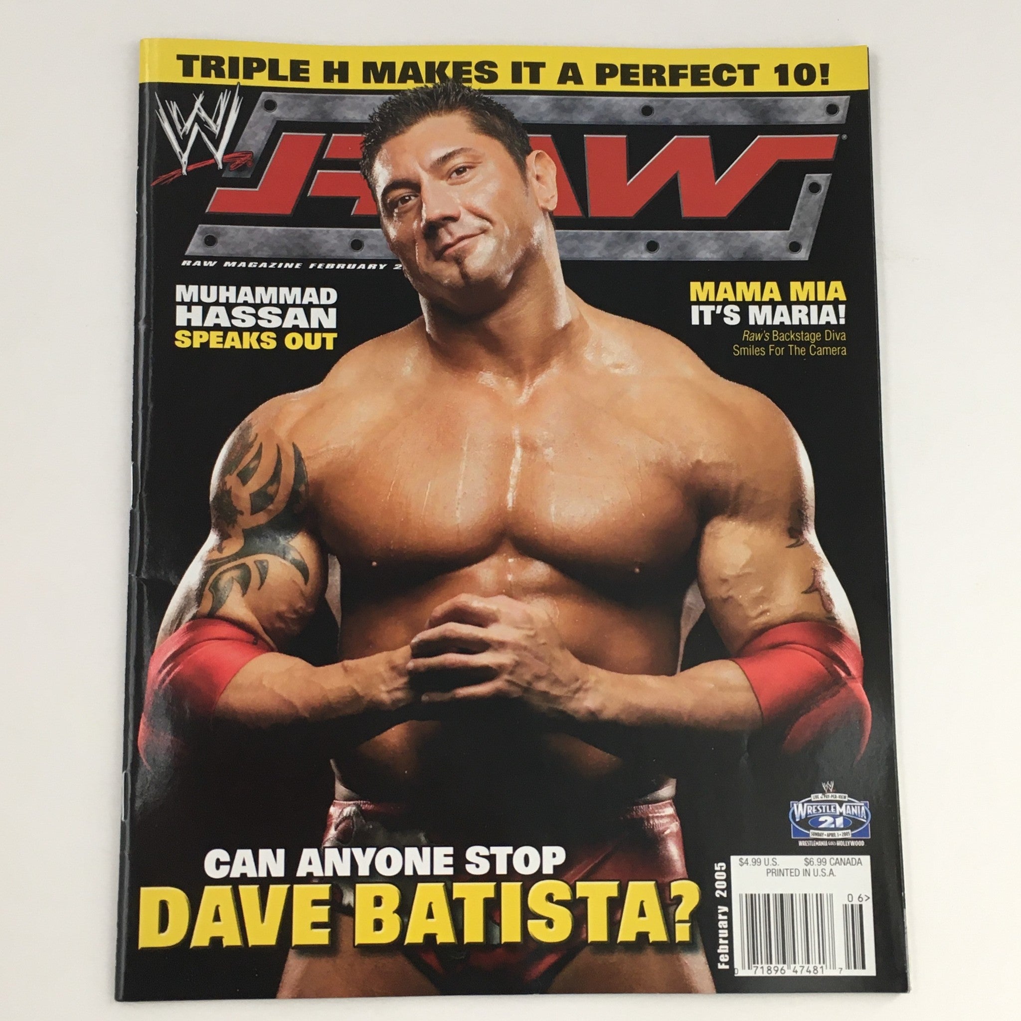 WWE Raw Magazine February 2005 featuring Dave Batista on the cover, showcasing his muscular physique and highlighting Muhammad Hassan's feature, perfect for wrestling collectors.