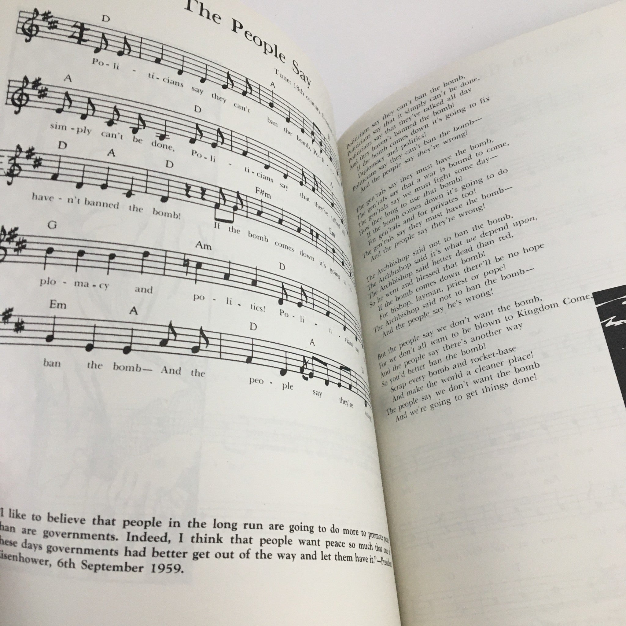 Sheet music and lyrics from the song 'The People Say' featured in the 1988 A New Settlement of Old Scores by John Brunner, showcasing topical songs reflecting cultural and political themes.