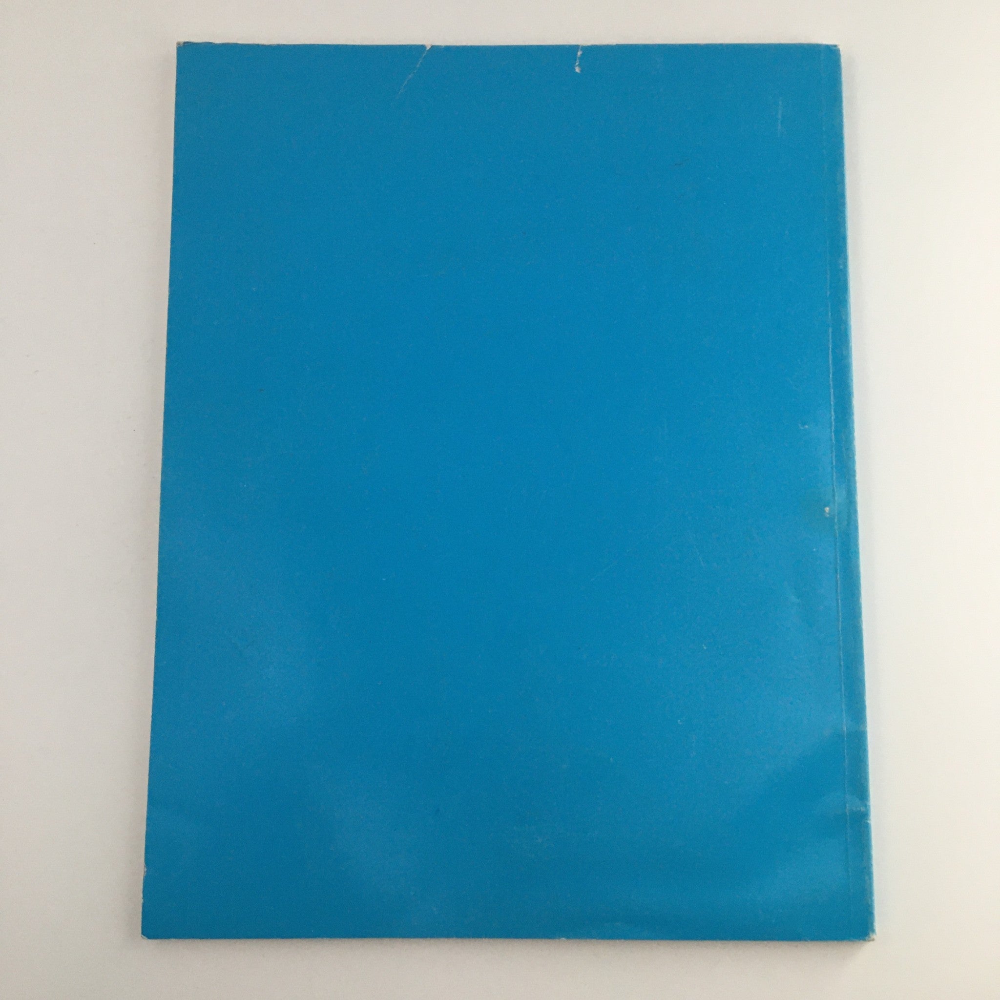 The back cover of the 1988 A New Settlement of Old Scores by John Brunner, highlighting the vintage magazine's design and preservation in good condition.