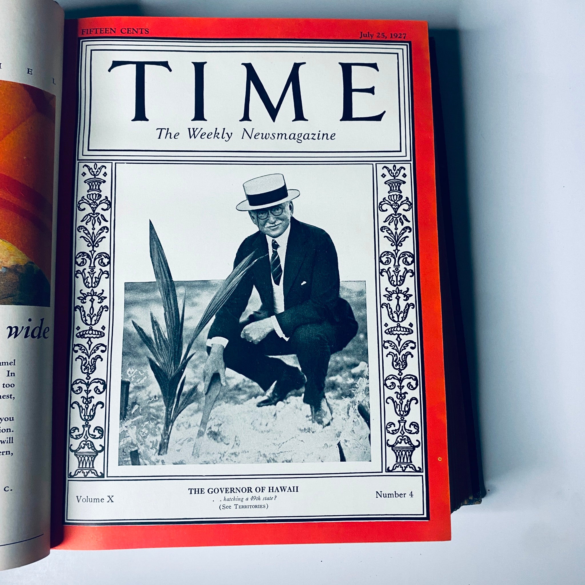 Cover of Time Magazine from July 25, 1927, featuring 'The Governor of Hawaii', depicting a man in a hat kneeling by a plant.