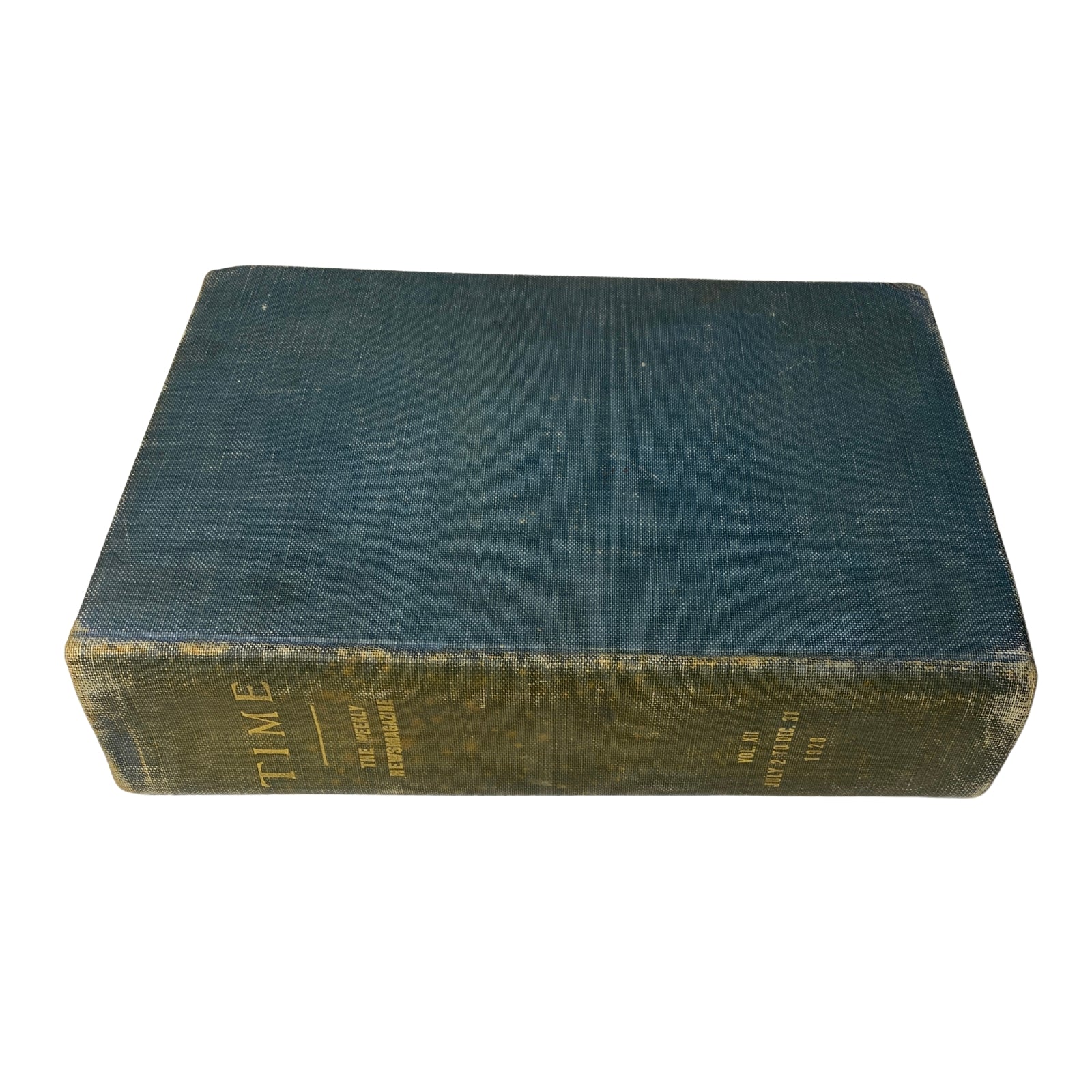 Spine view of the Time Magazine Bound Weekly volume, illustrating the aged beauty of historical journalism from 1928.