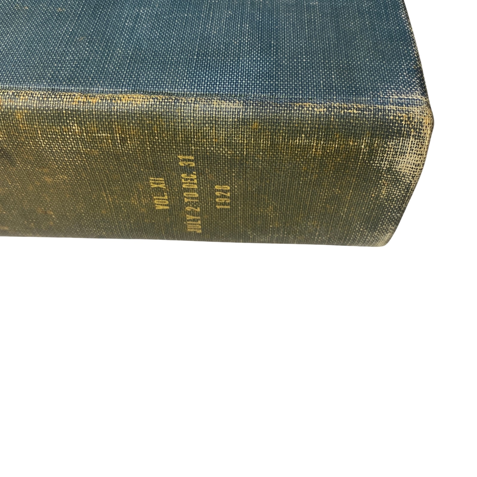 Detailed view of the spine of the Time Magazine Bound Weekly from 1928, emphasizing the wear and character of this vintage publication.
