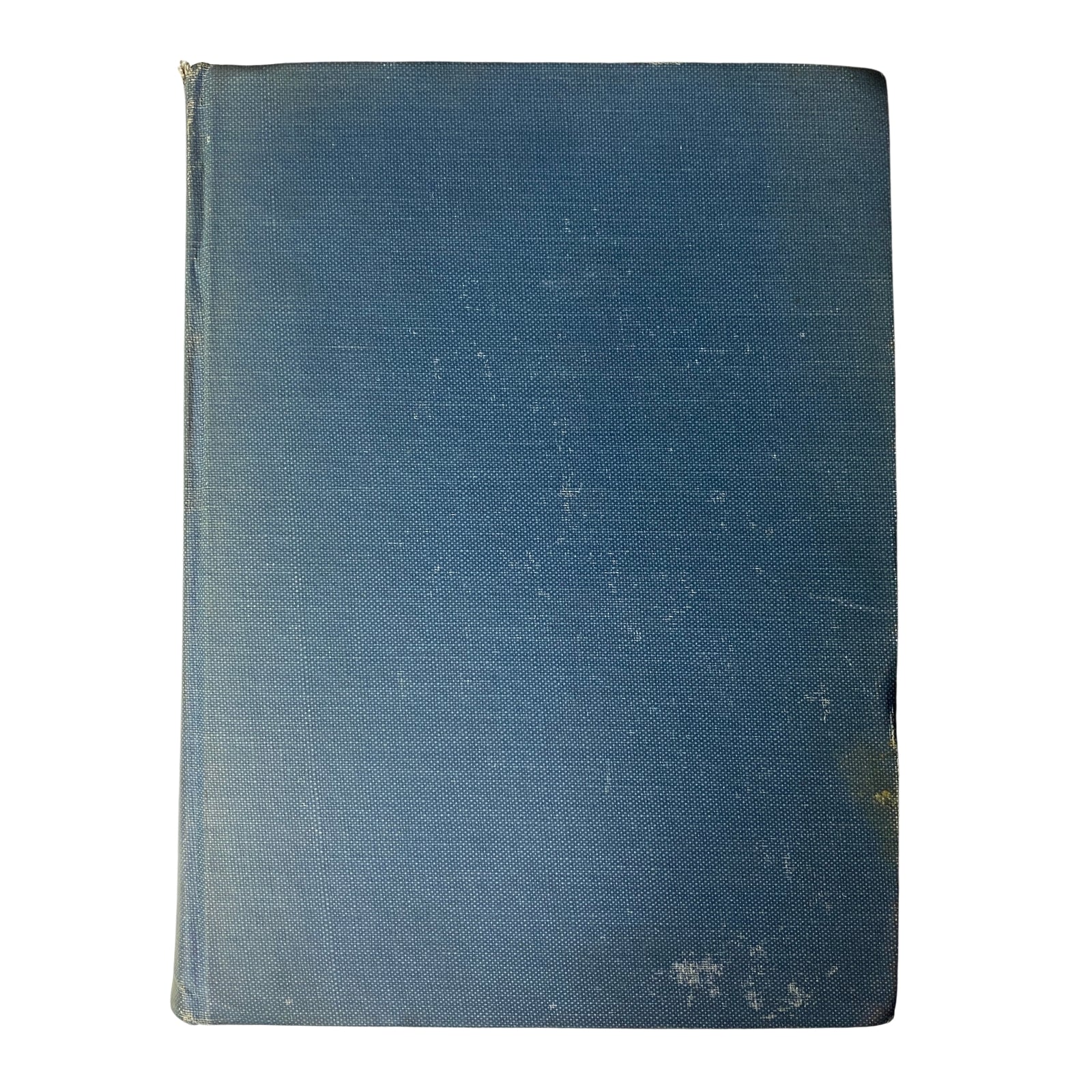 Back cover of a bound edition of Time Magazine, featuring a worn blue cloth cover, indicative of its age and historical significance.
