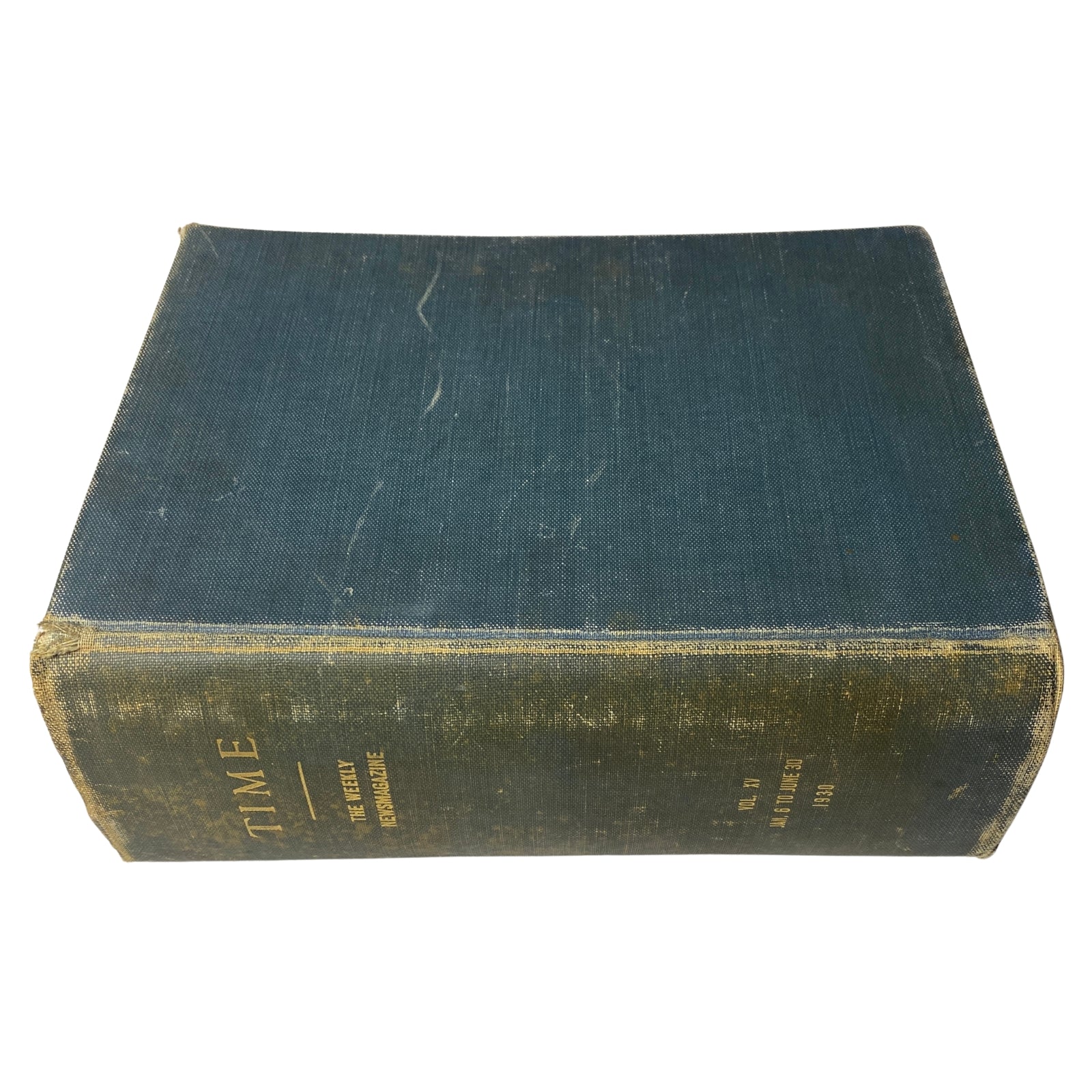 Side view of the Time Magazine Bound Weekly January 6 to June 30, 1930, highlighting the binding and worn condition of the book.