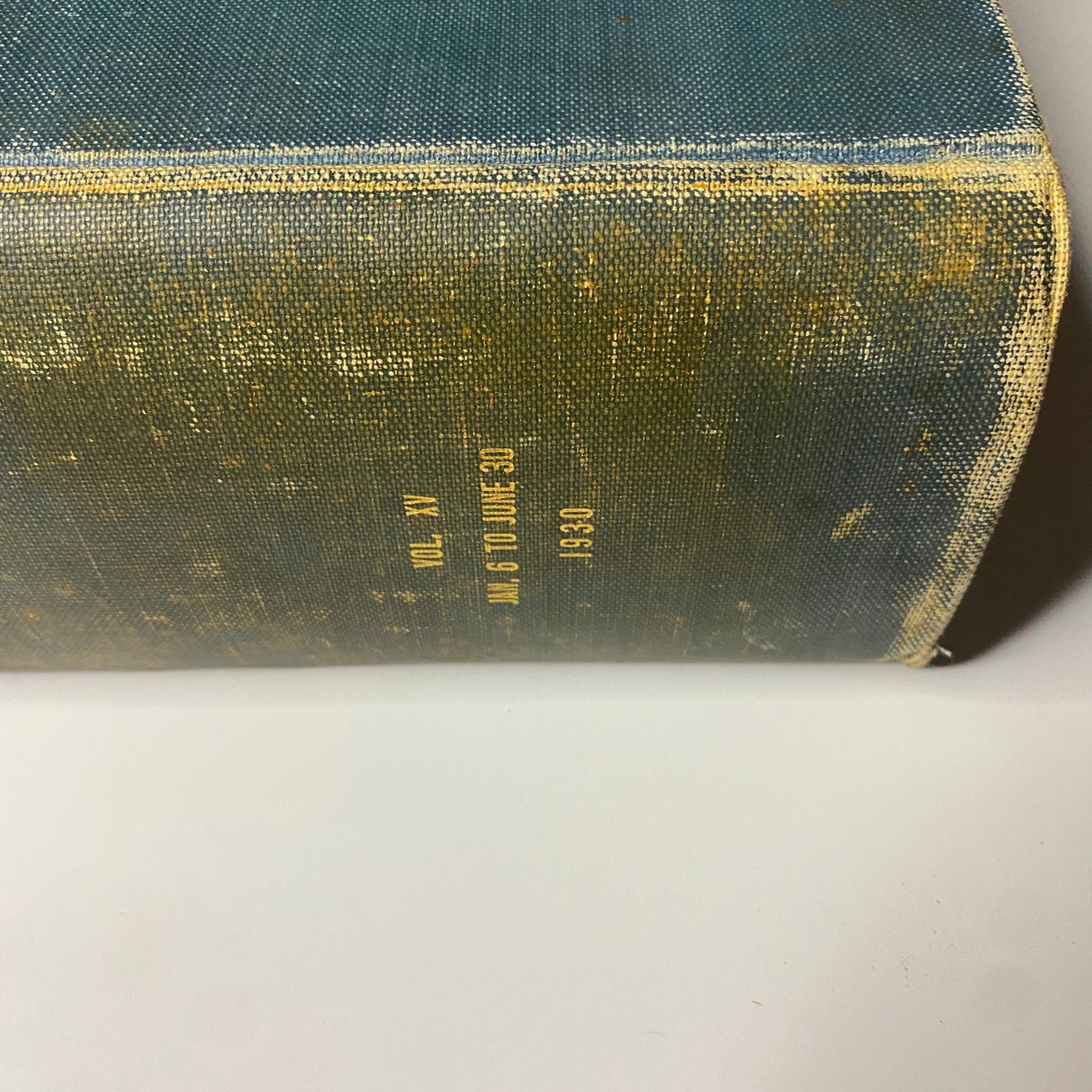 Bottom view of the spine of 'Time Magazine Bound Weekly January 6, 1930 - June 30, 1930', featuring the publication year and volume number embossed in gold.