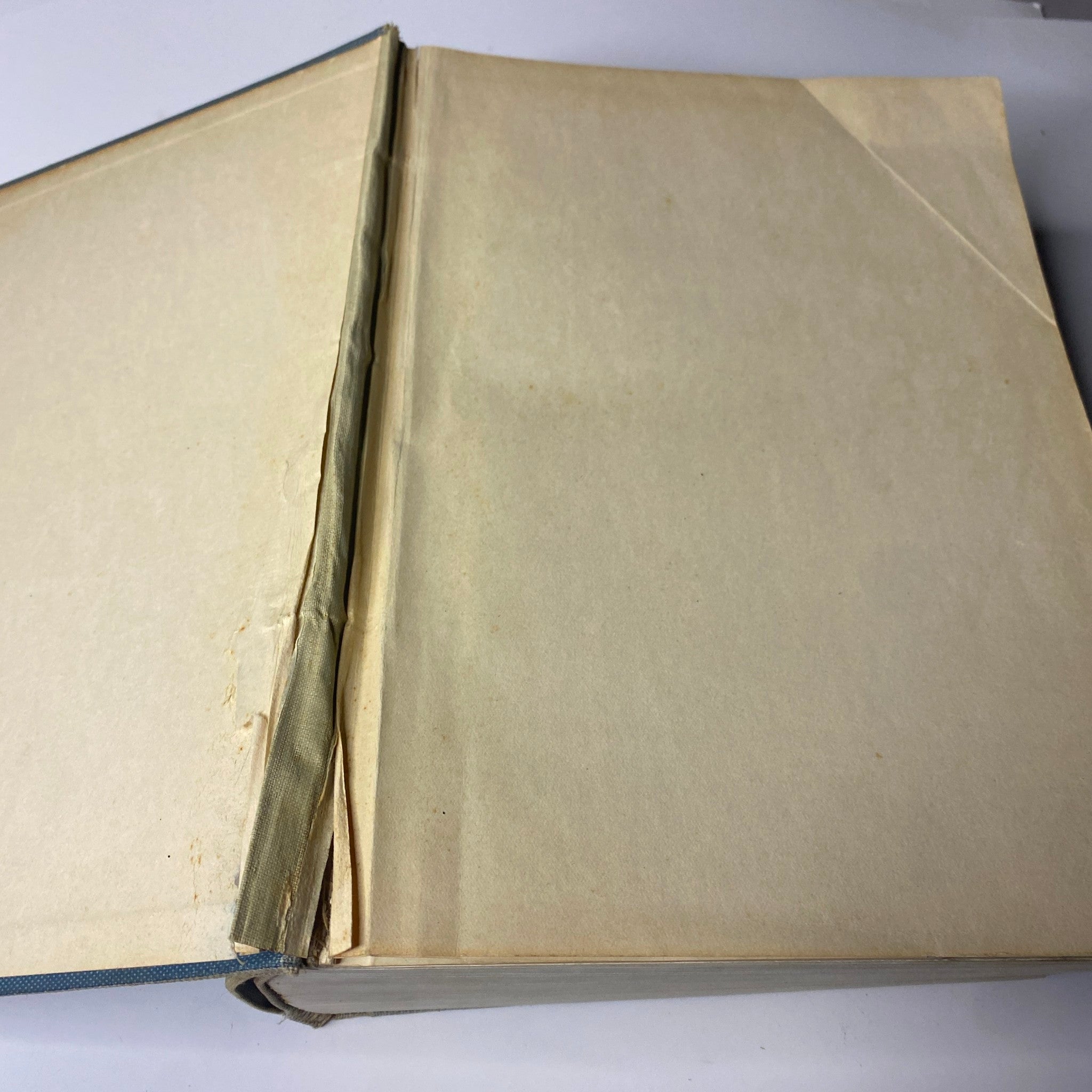 Open view of the inside cover of 'Time Magazine Bound Weekly January 6, 1930 - June 30, 1930', displaying the blank yellowed pages typical of an older bound volume.