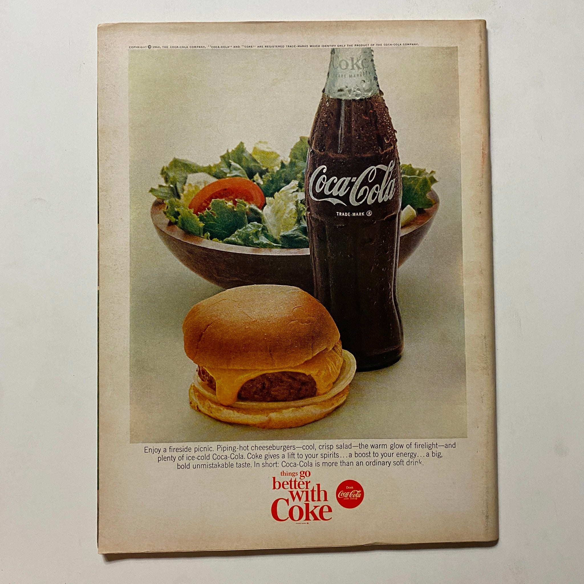 Back cover of VTG Hot Rod Magazine January 1966 with a vintage Coca-Cola advertisement featuring a cheeseburger and salad, emphasizing classic American dining.