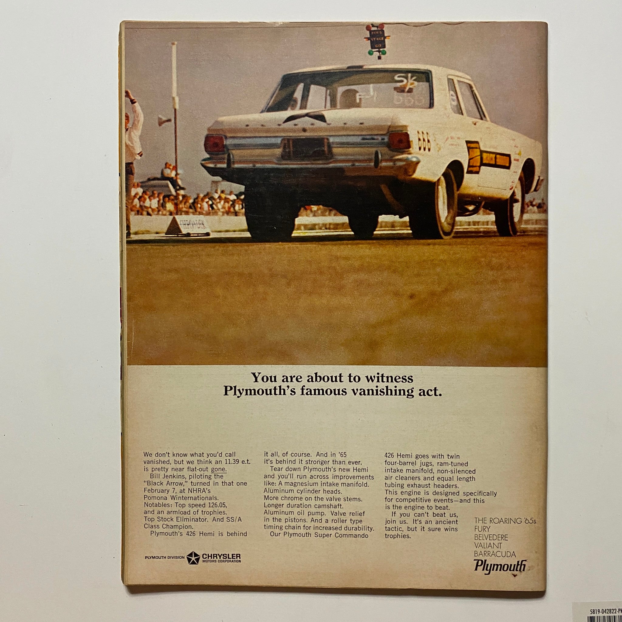 Back cover of VTG Hot Rod Magazine June 1965 showcasing an advertisement for Plymouth’s car, emphasizing its performance and racing capabilities.