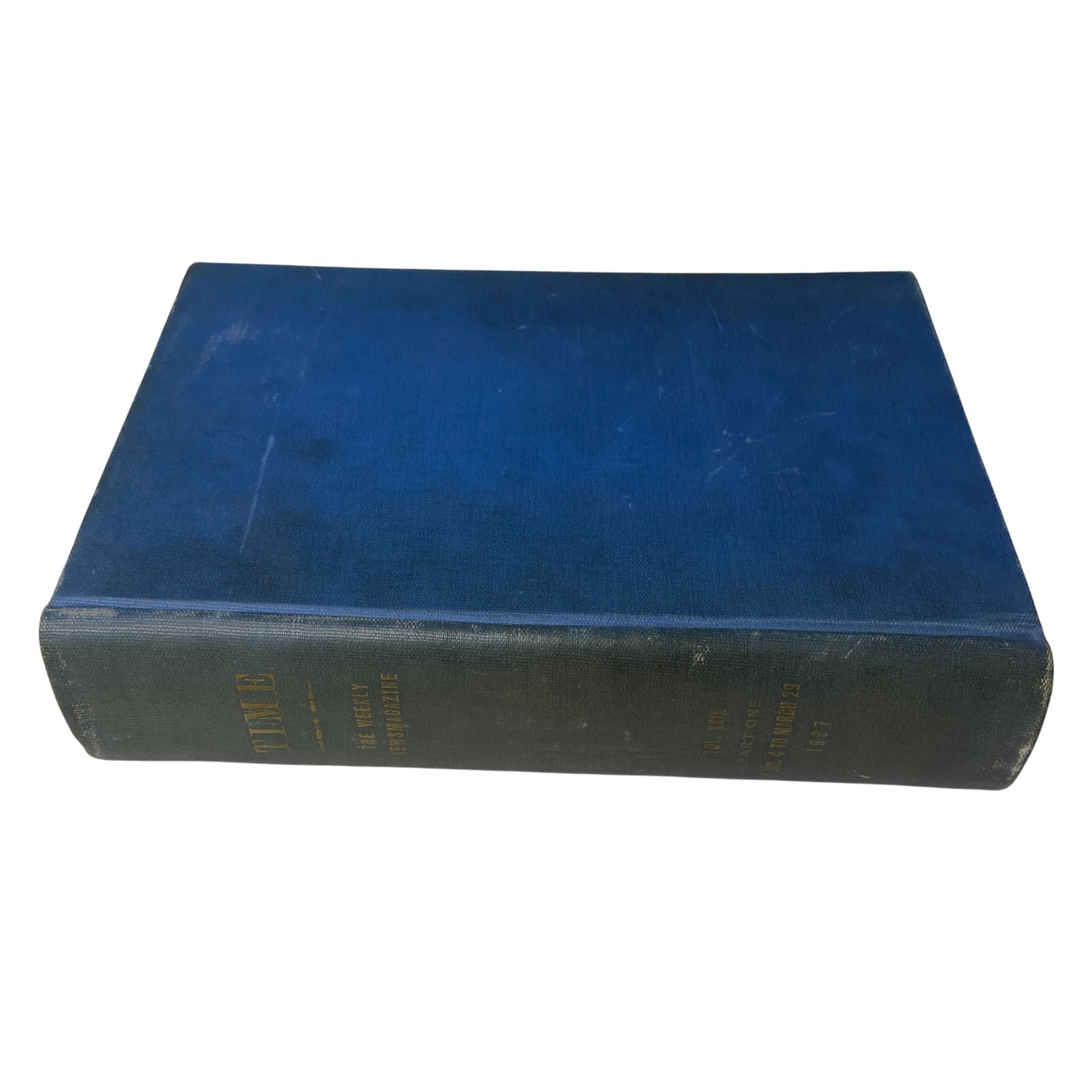 Top view of a library-bound edition of Time Magazine from 1937, featuring blue fabric cover, preserving issues from January 4 to March 29.