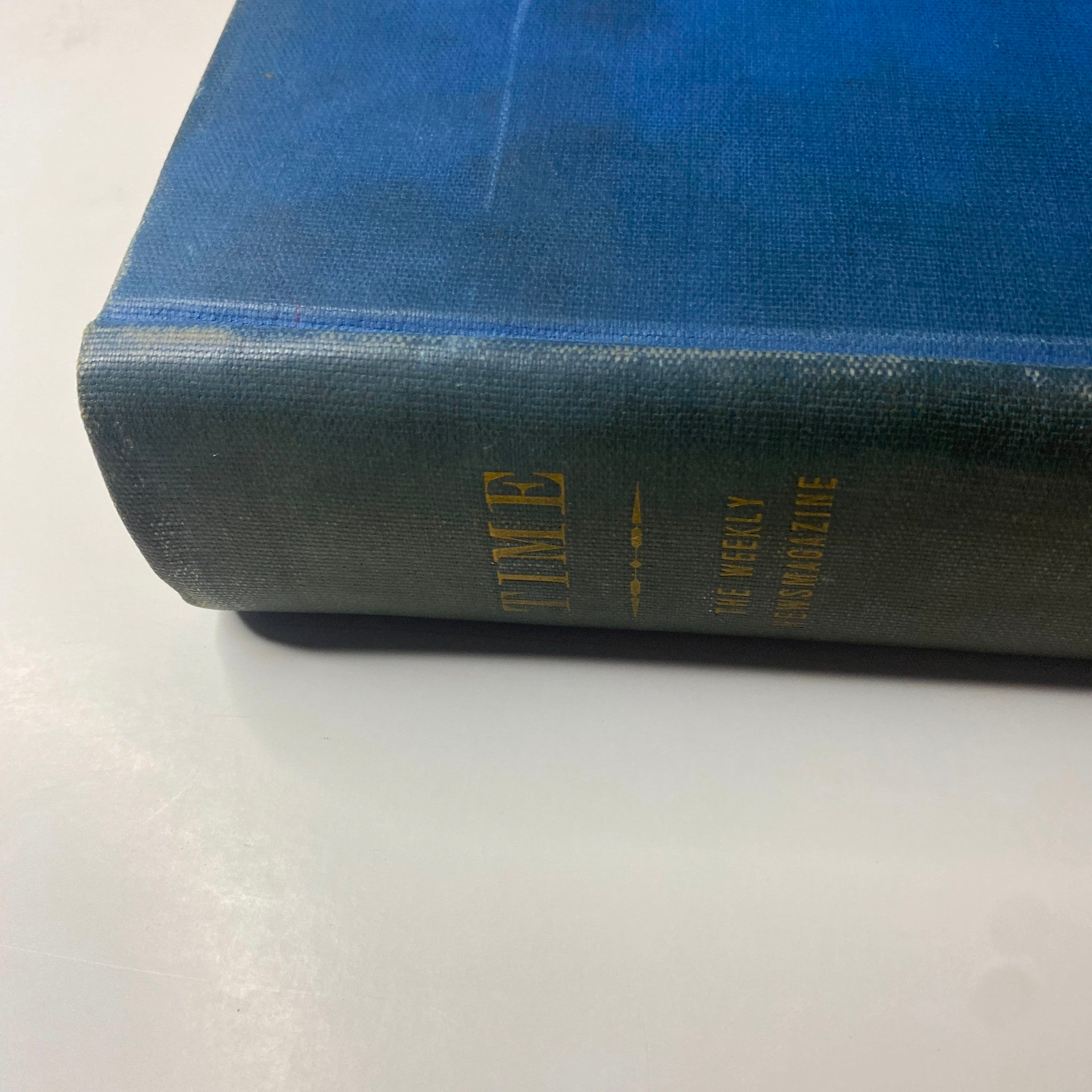 Side view of the library-bound volume of Time Magazine, displaying the title and the year 1937, encompassing news articles from January to March.