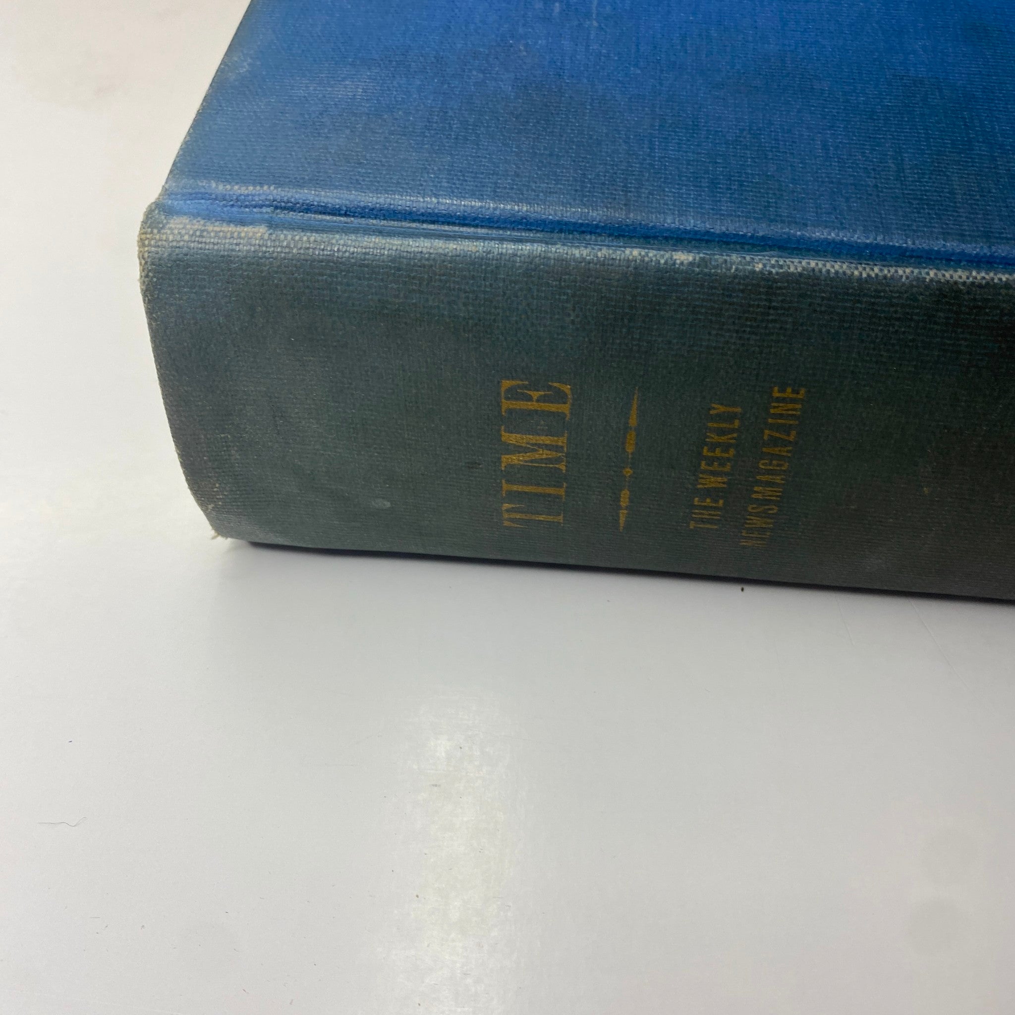 Detailed view of the spine of Time Magazine Library Bound April 5- June 28, 1937, highlighting the title 'TIME' and the publication year.