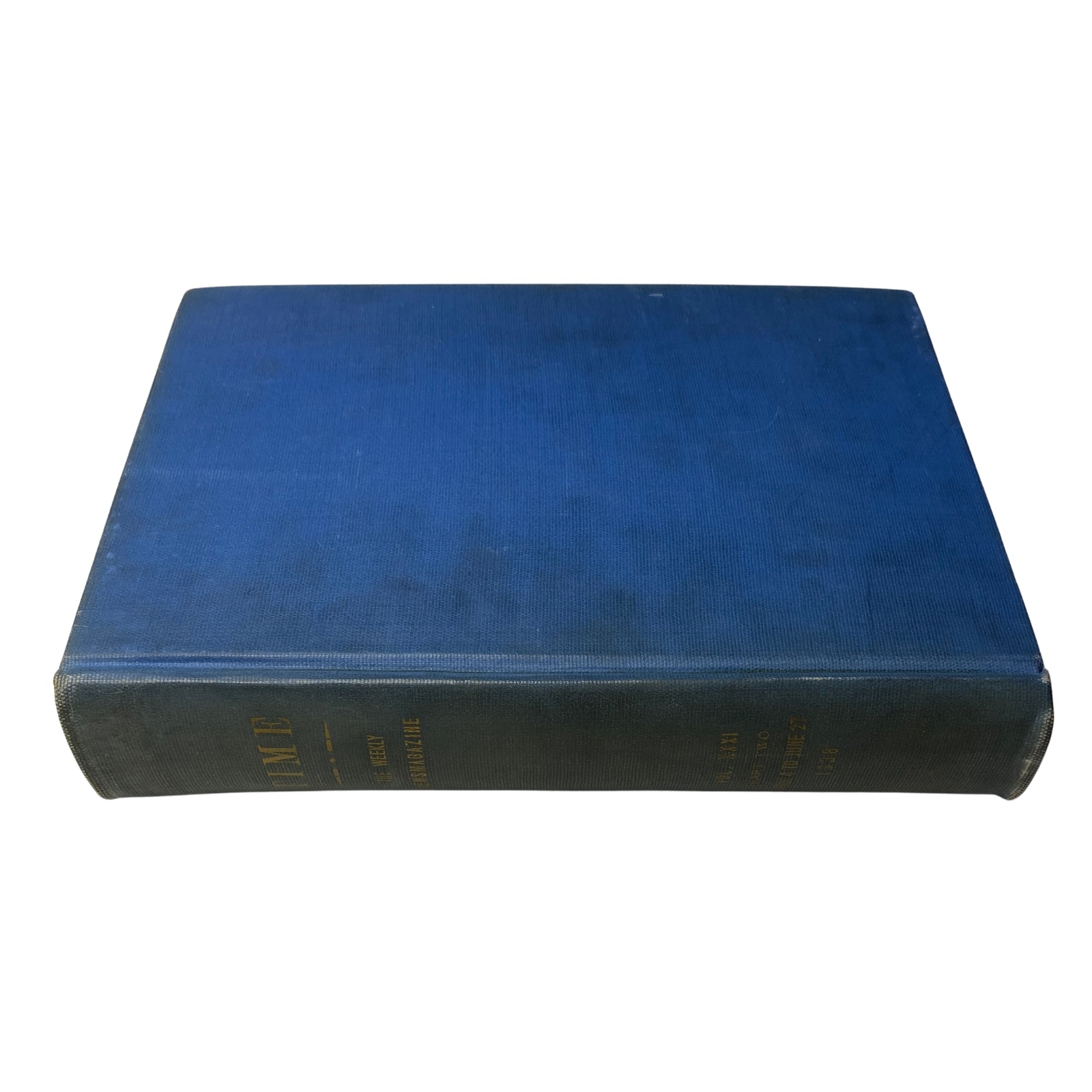 Side view of the blue hardcover of the Time Magazine bound volume, displaying the binding and title 'Time,' as part of the Albert Einstein 1938 Reza Shah Pahlavi April-June collection.