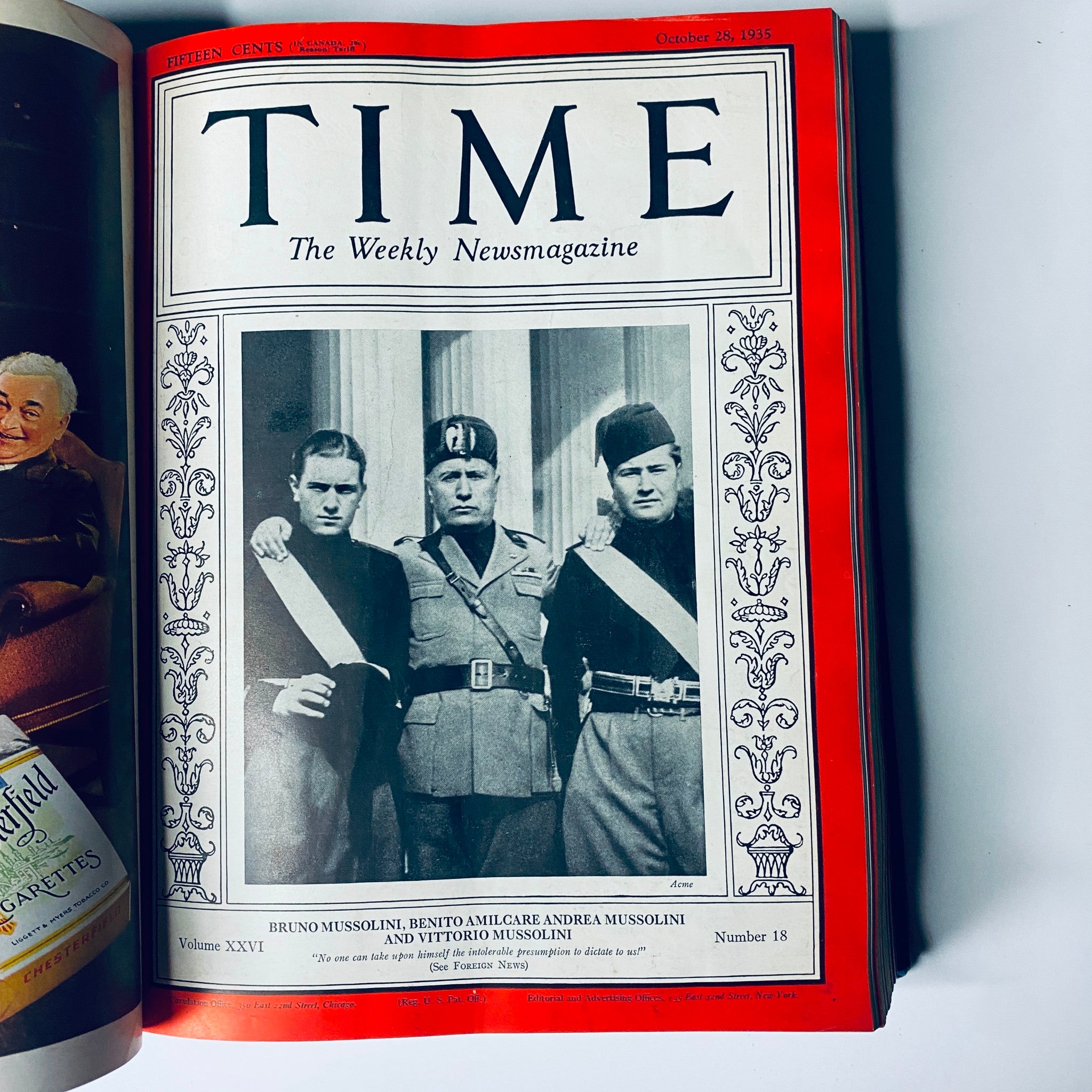 Title: Time Magazine Library Bound October 7- December 30, 1935. Cover of the October 28, 1935 issue, featuring an image of Mussolini and his family, reflecting historical European politics.