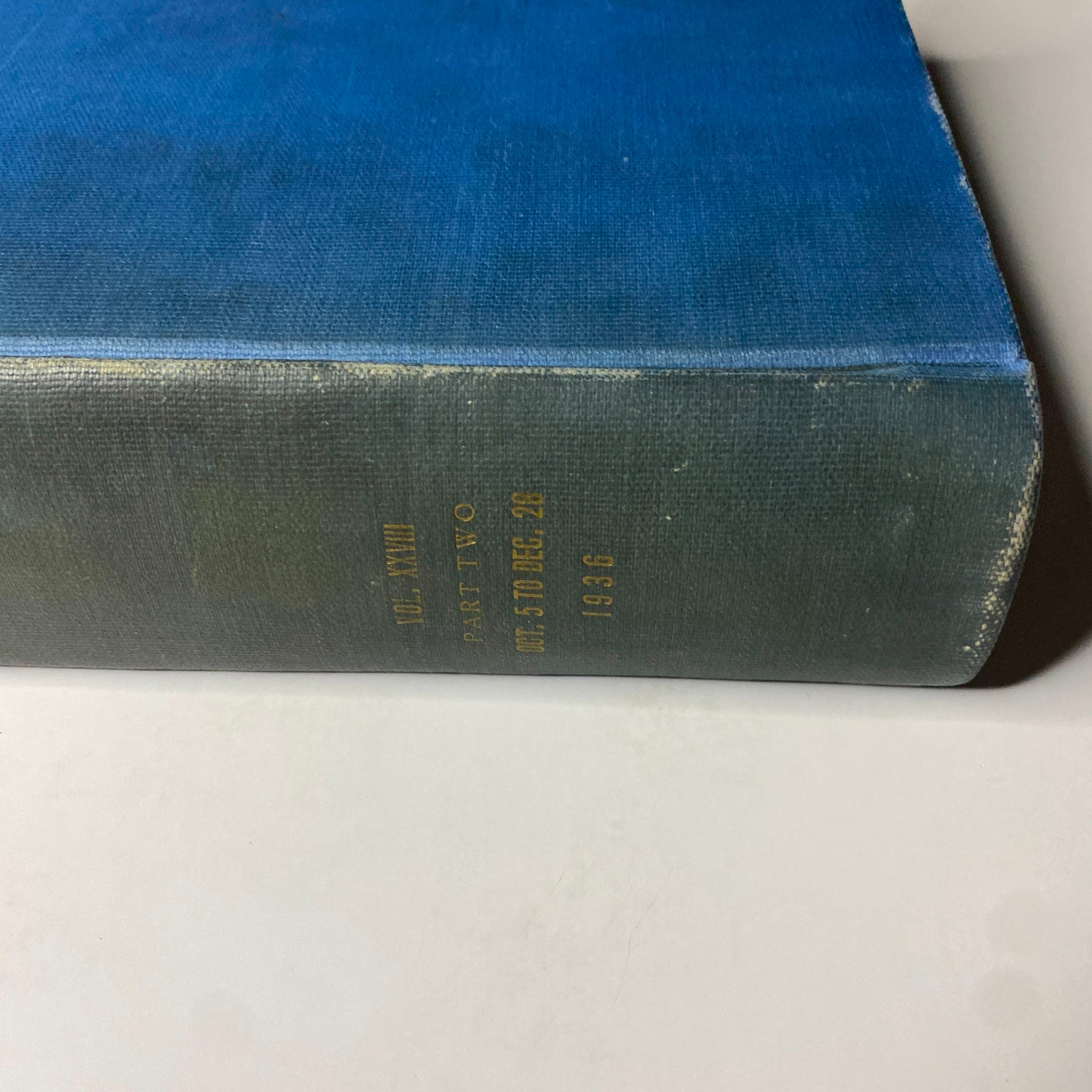 Detailed view of the spine of Time Magazine Library Bound edition, showing publication dates October 5 to December 28, 1936.