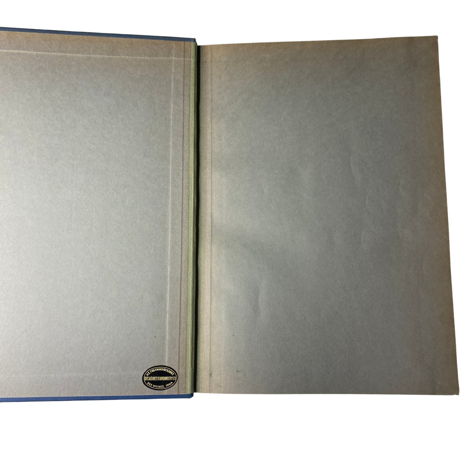 Interior view of the Time Magazine Library Bound volume, featuring a blank page with a library stamp for preservation.