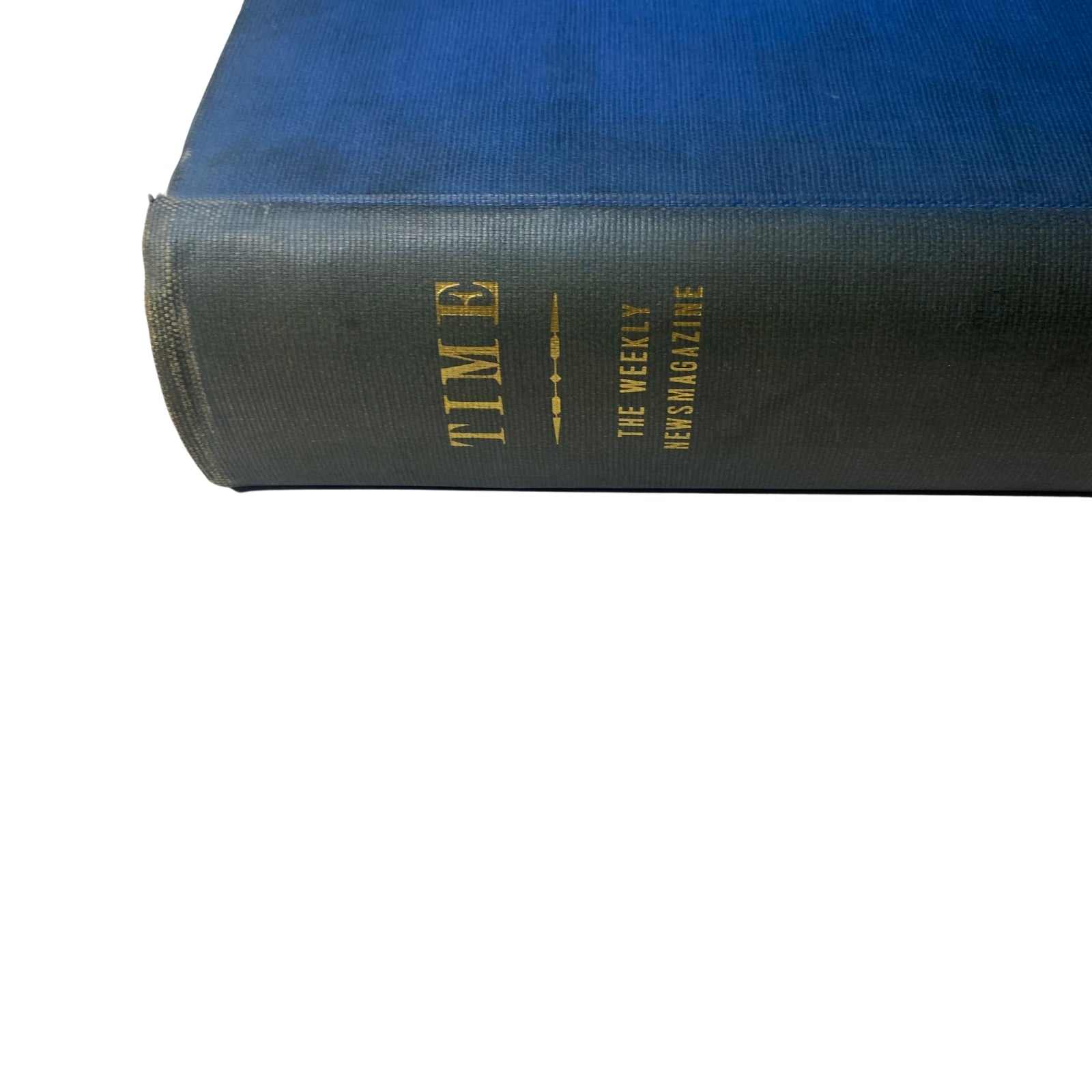 Close-up view of the spine of the Library Bound Weekly, showcasing the title 'Time: The Weekly Newsmagazine' for the period April 1 to June 24, 1940.