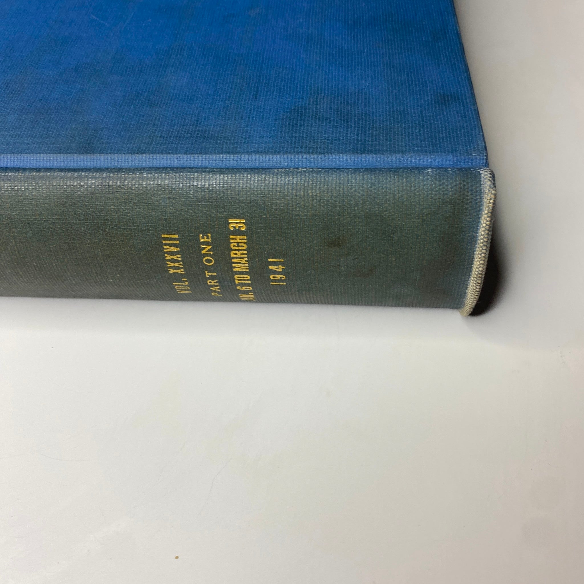 Another view of the Time Magazine library edition, highlighting its blue textured cover and gold detailing, vital for book collectors.