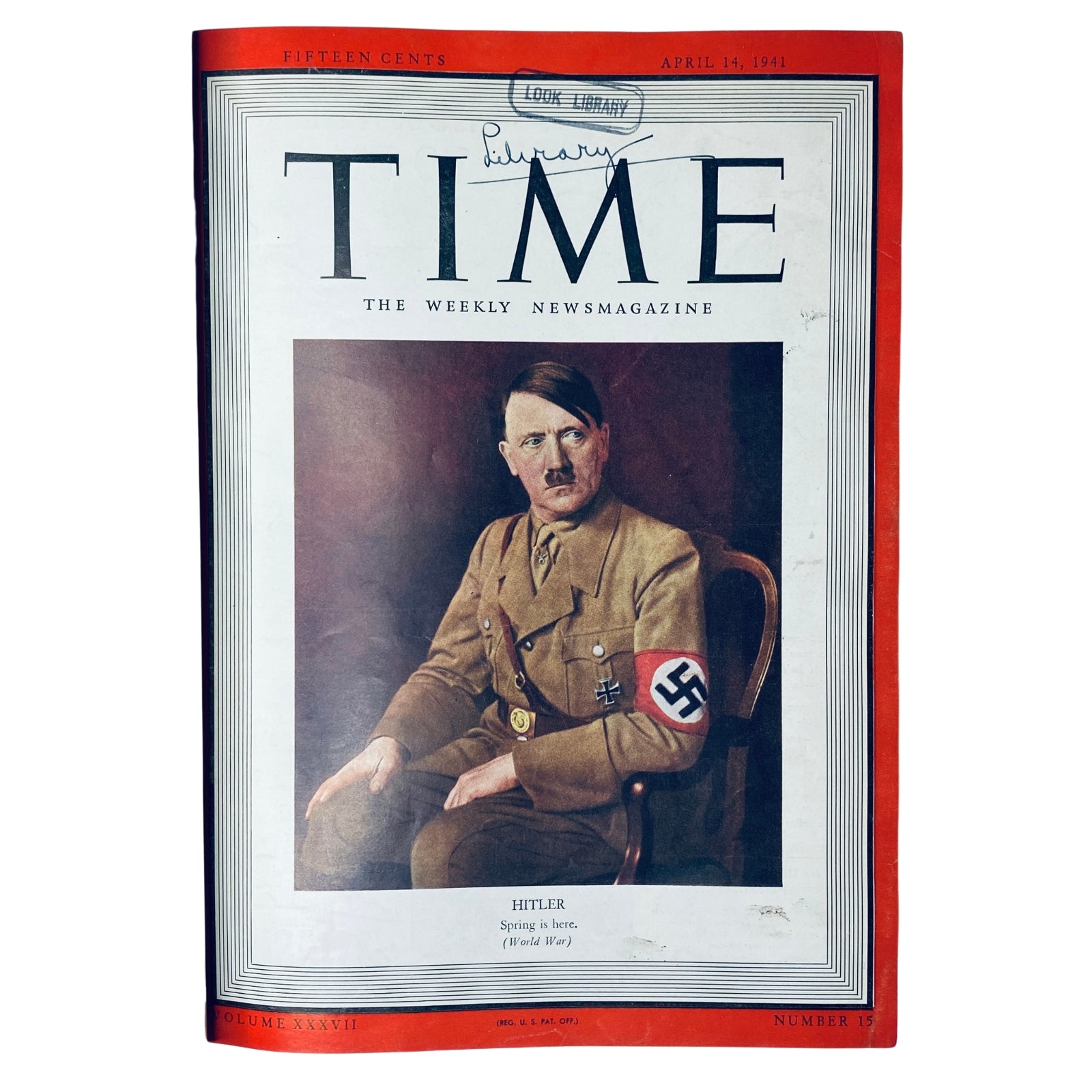 Time Magazine cover from April 14, 1941 featuring Adolf Hitler as the Man of the Year, with 'Look Library' stamp, showcasing a portrait of Hitler in military attire.