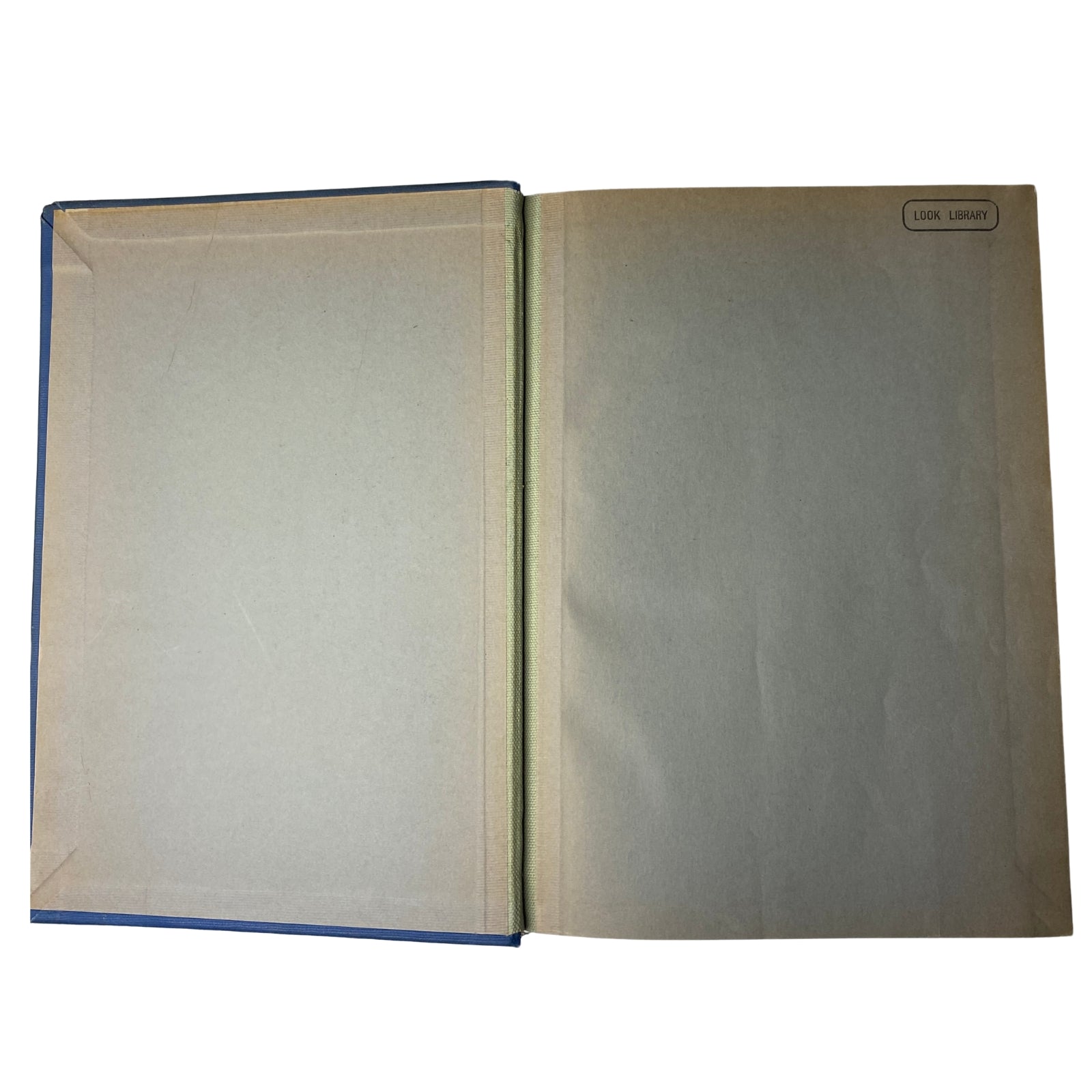 Unmarked interior pages of the library bound Time Magazine volume titled 'Time Magazine Library Bound January 3, 1938 - March 28, 1938 Frank Lloyd Wright' featuring a 'LOOK LIBRARY' stamp.