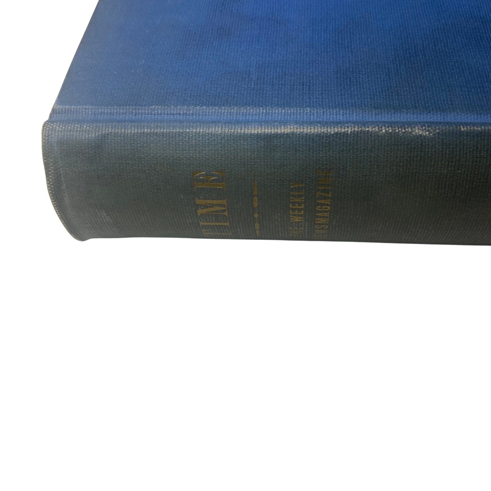 Side view of the library bound volume of Time Magazine titled 'Time Magazine Library Bound April-June 26, 1939 Hitler’s Heinrich Himmler', showcasing the title embossed in gold.