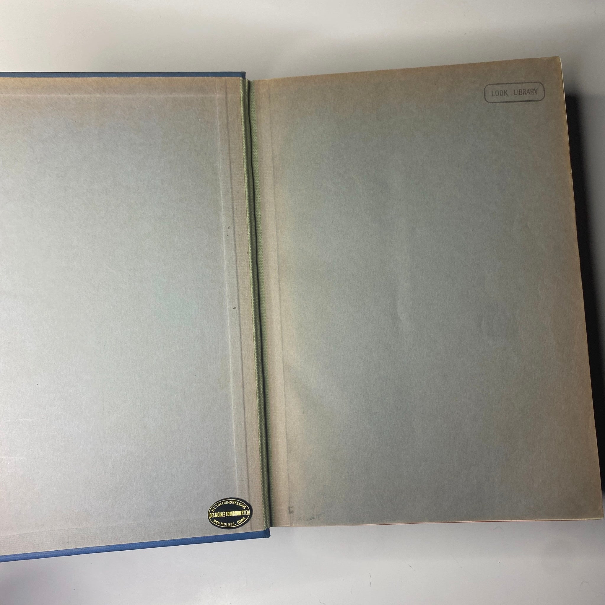 Interior view of the library bound volume of Time Magazine titled 'Time Magazine Library Bound April-June 26, 1939 Hitler’s Heinrich Himmler', showing the inside cover with a 'Look Library' stamp.