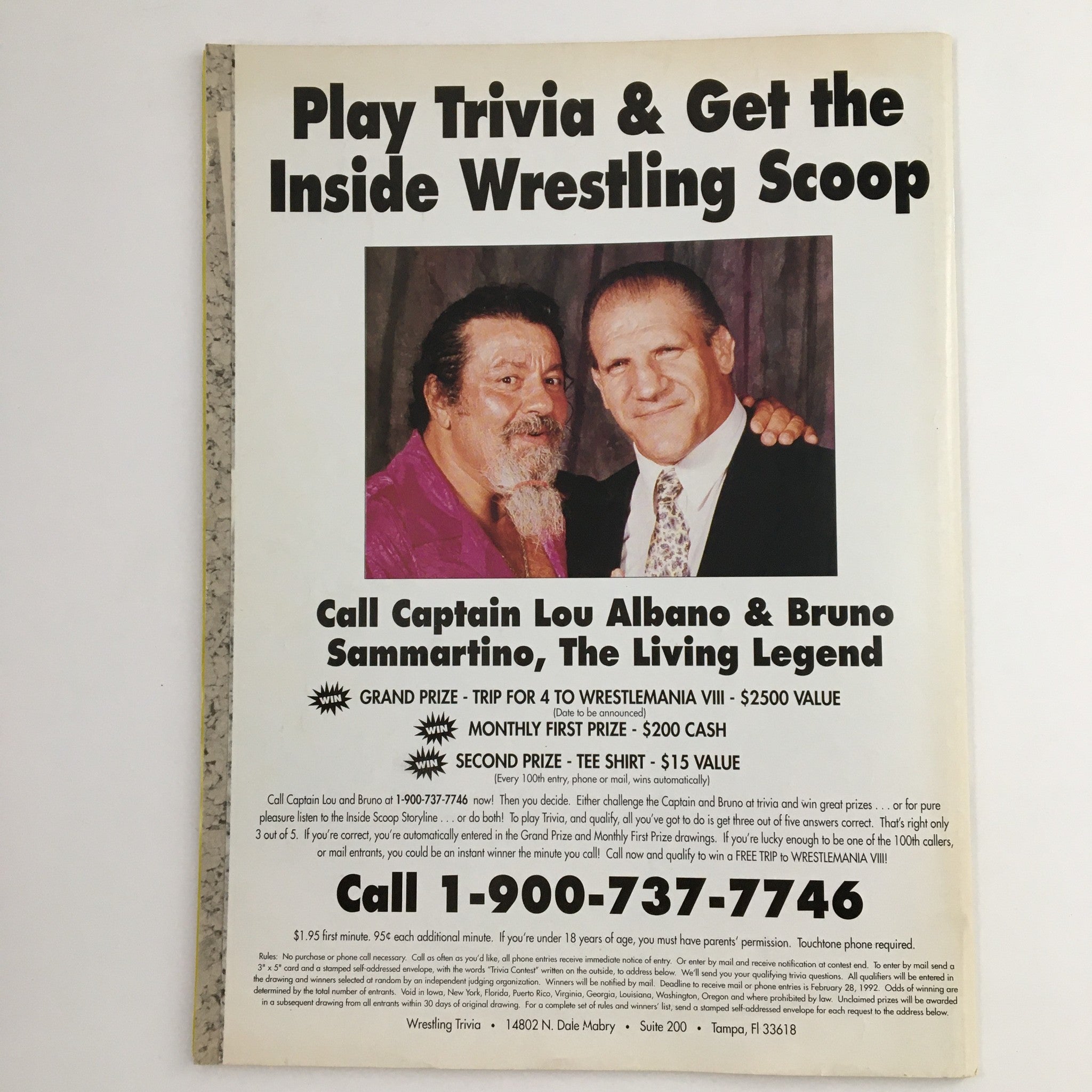 Back cover of Pro Wrestling Illustrated January 1992 promoting a trivia game with images of wrestling legends Captain Lou Albano and Bruno Sammartino.