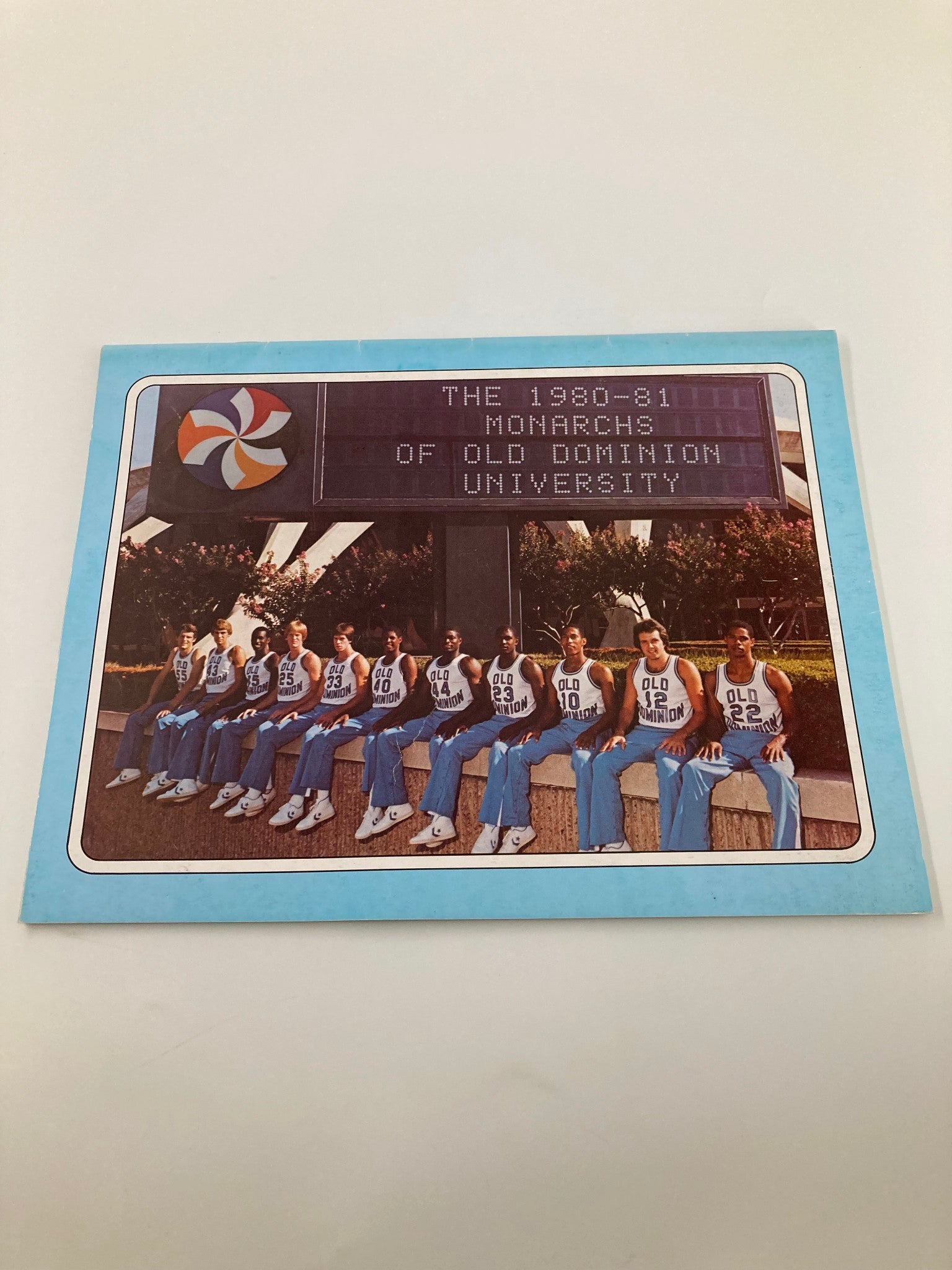 VTG 1980-1981 Monarchs of Old Dominion University Program cover featuring the team lineup with players seated in basketball uniforms, showcasing the university logo.