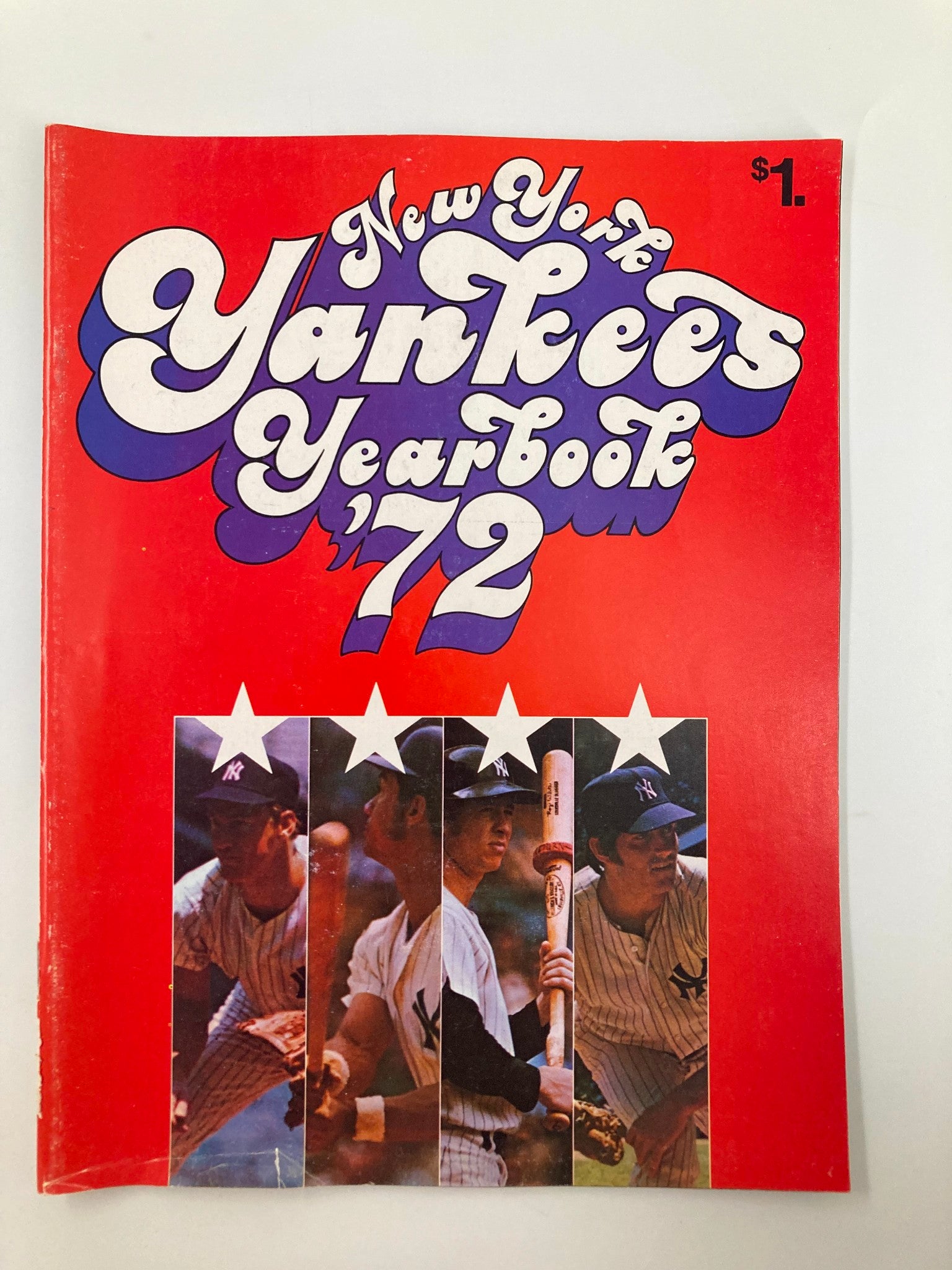 1972 MLB New York Yankees Official Yearbook featuring vibrant retro design and photographs of team players, highlighting Ralph Houk as the manager, perfect for baseball memorabilia collectors.
