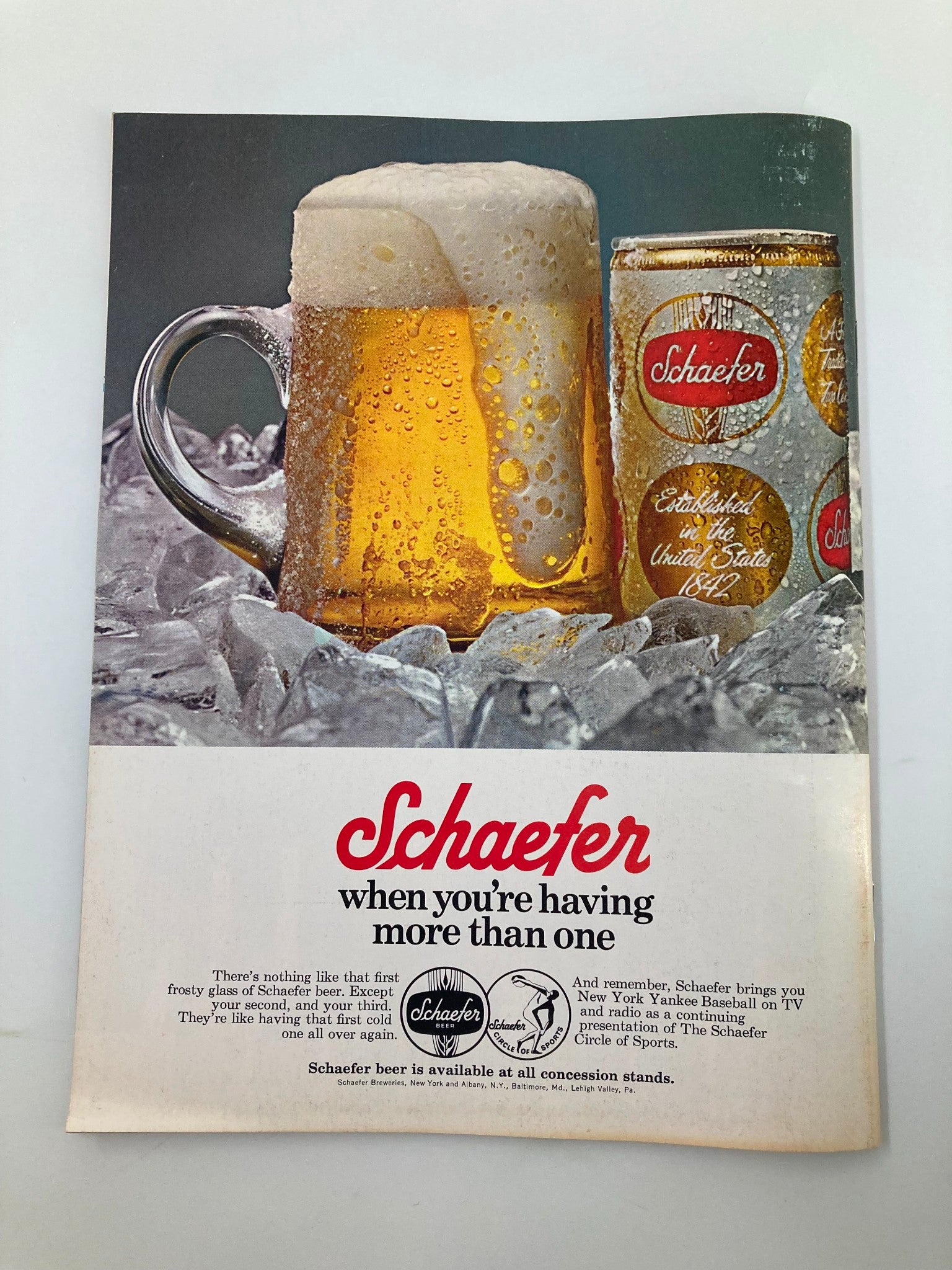 Advertisement for Schaefer beer in the 1972 MLB New York Yankees Official Yearbook, highlighting its ice-cold refreshing taste.