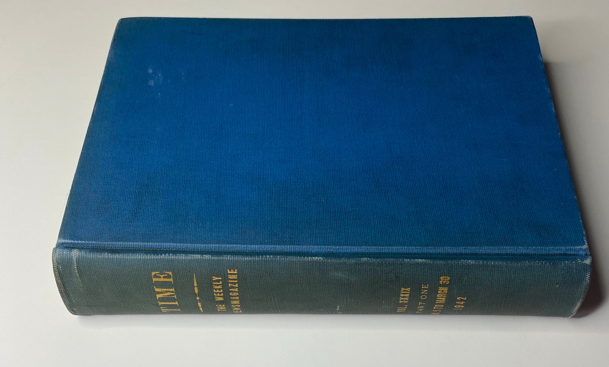 Top view of Time Magazine Library Bound Weekly January 5, 1942 - March 30, 1942, showcasing its blue cover and gold lettering.