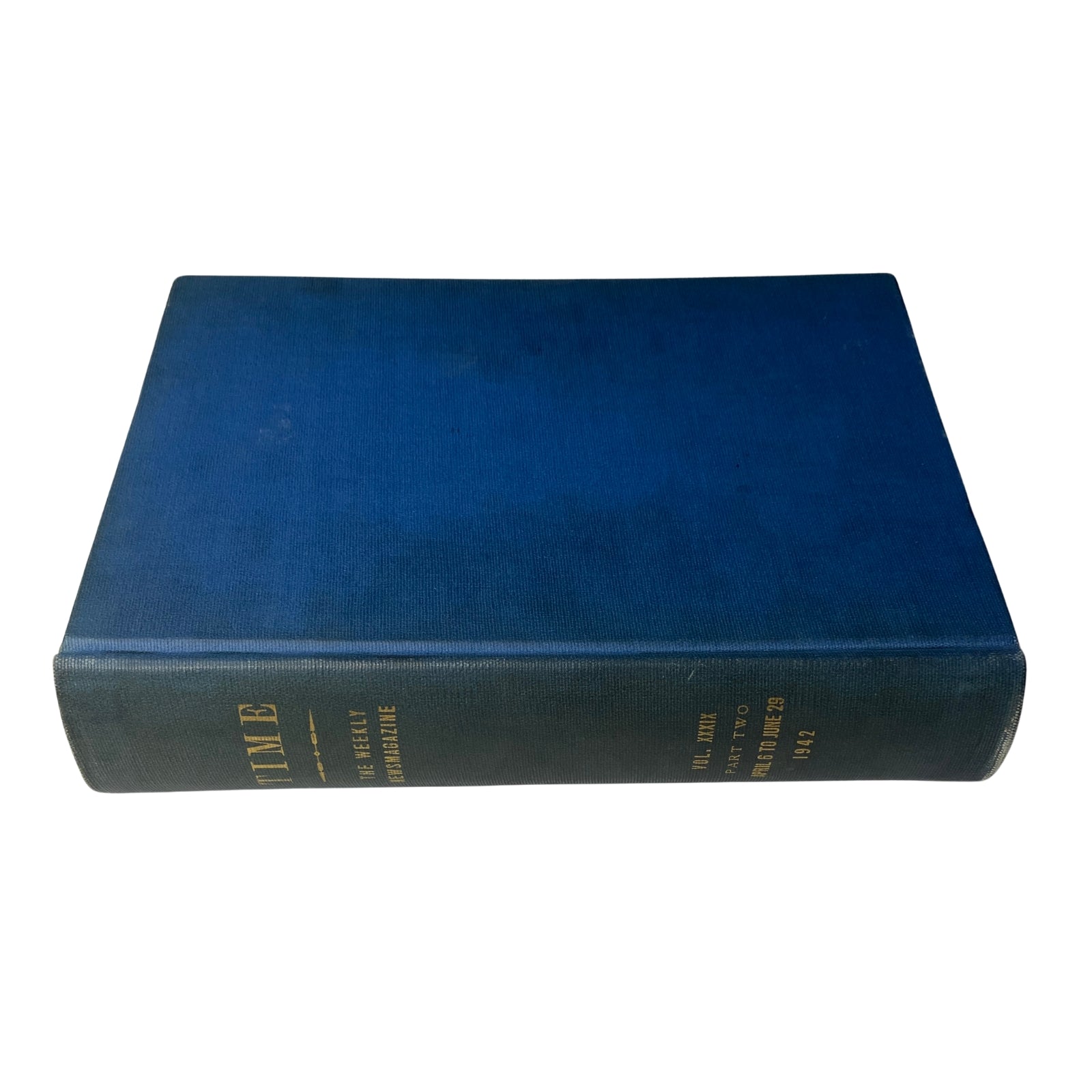 Spine view of the blue library bound volume of Time Magazine covering weekly editions from April to June 1942, highlighting the title and part details.