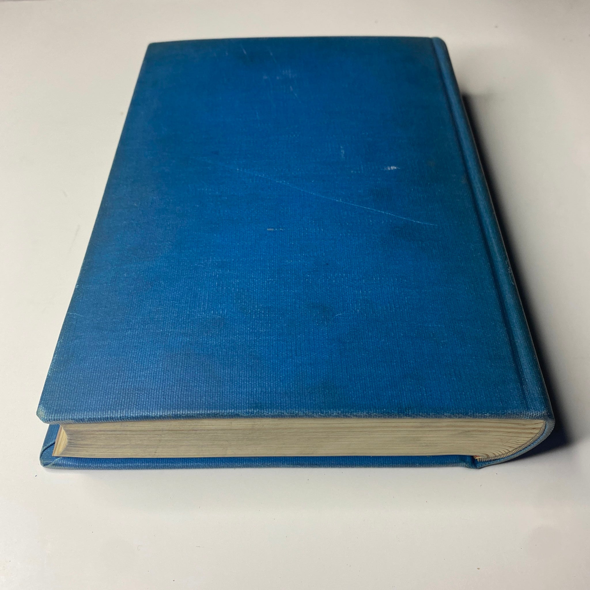 Side view of the blue hardcover Time Magazine Library Bound July-Sept 1942, highlighting its thickness and well-maintained binding.