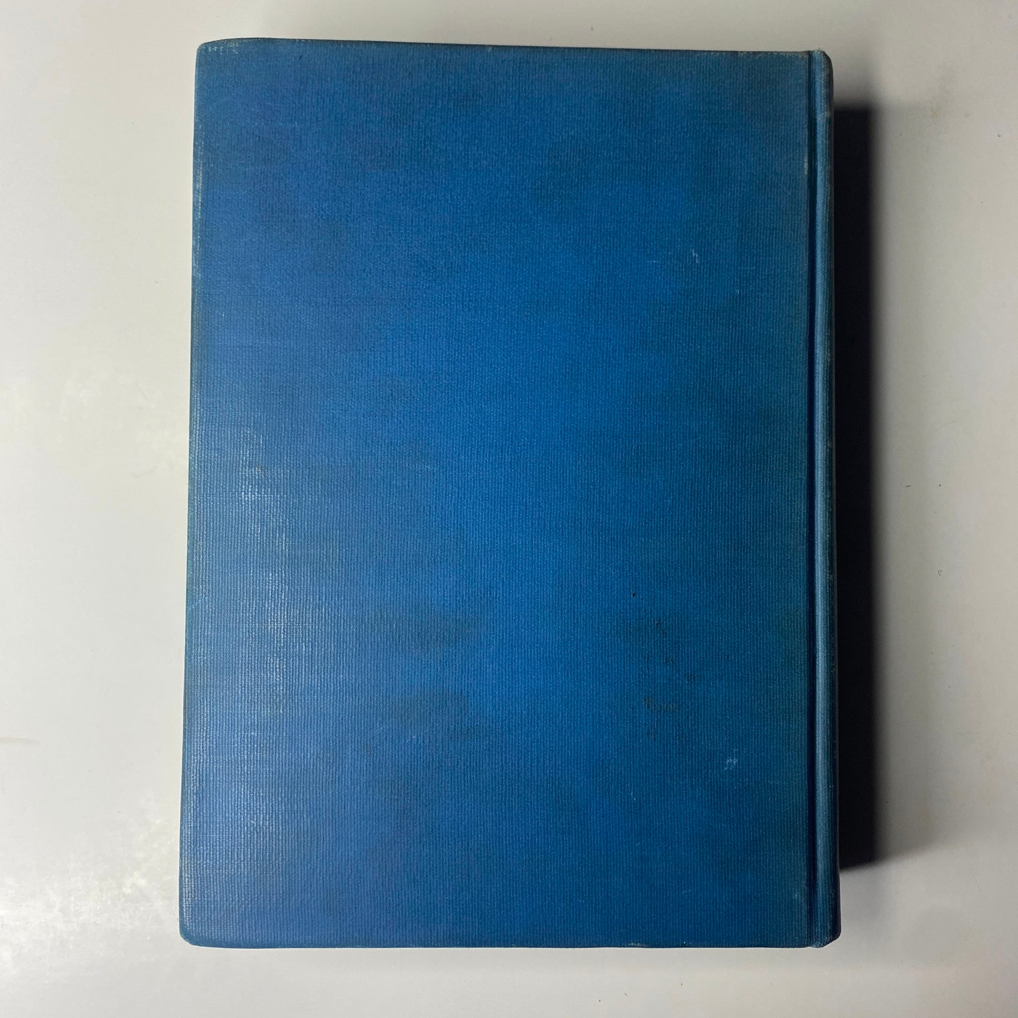 View of the back cover of the 'Time Magazine Library Bound Weekly' volume, showing solid blue binding.
