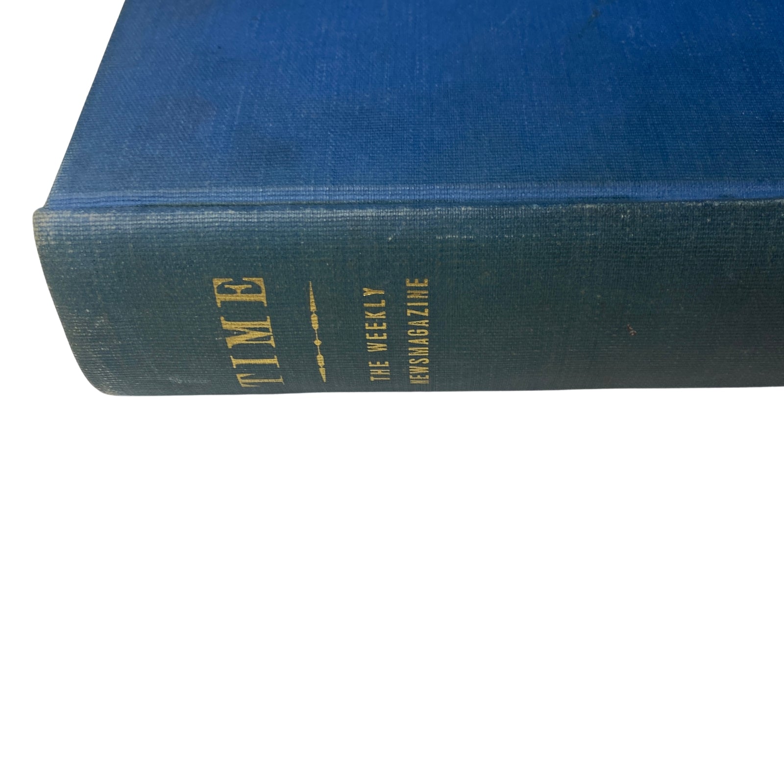 Close-up view of the spine of the Time Library Bound Weekly Magazine, clearly labeled as the weekly news magazine.