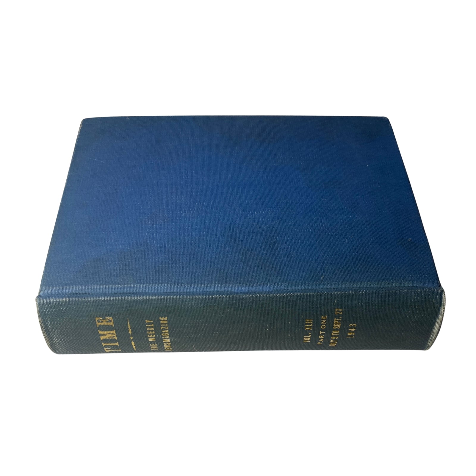 Side view of the Time Library Bound Weekly Magazine, showcasing a sturdy blue binding and gold lettering for the year 1943.