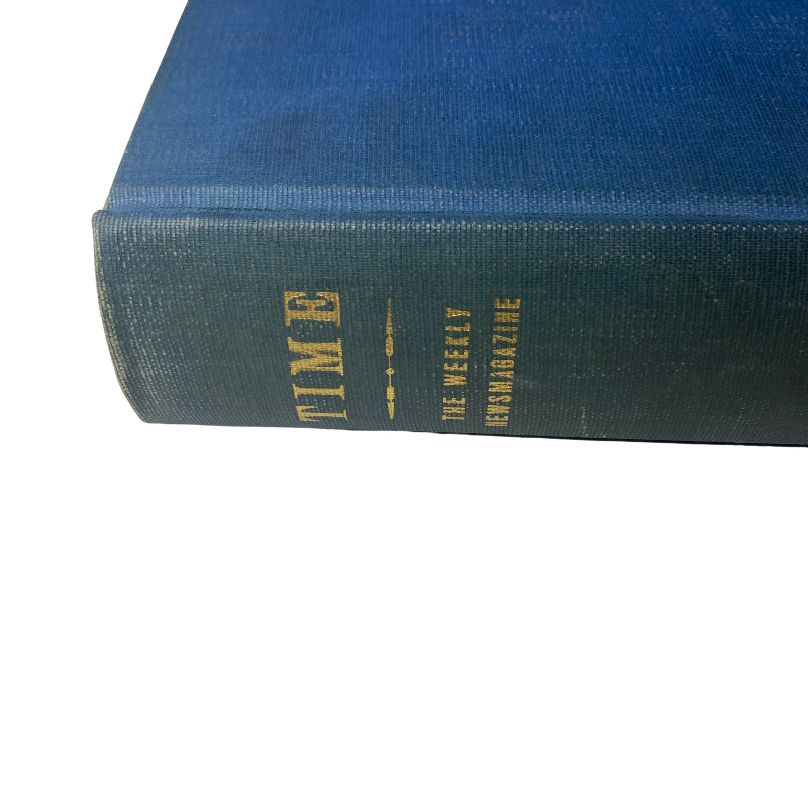 Top view of the Time Library Bound Weekly Magazine, featuring a blue hardcover with embossed title 'Time: The Weekly Newsmagazine'.