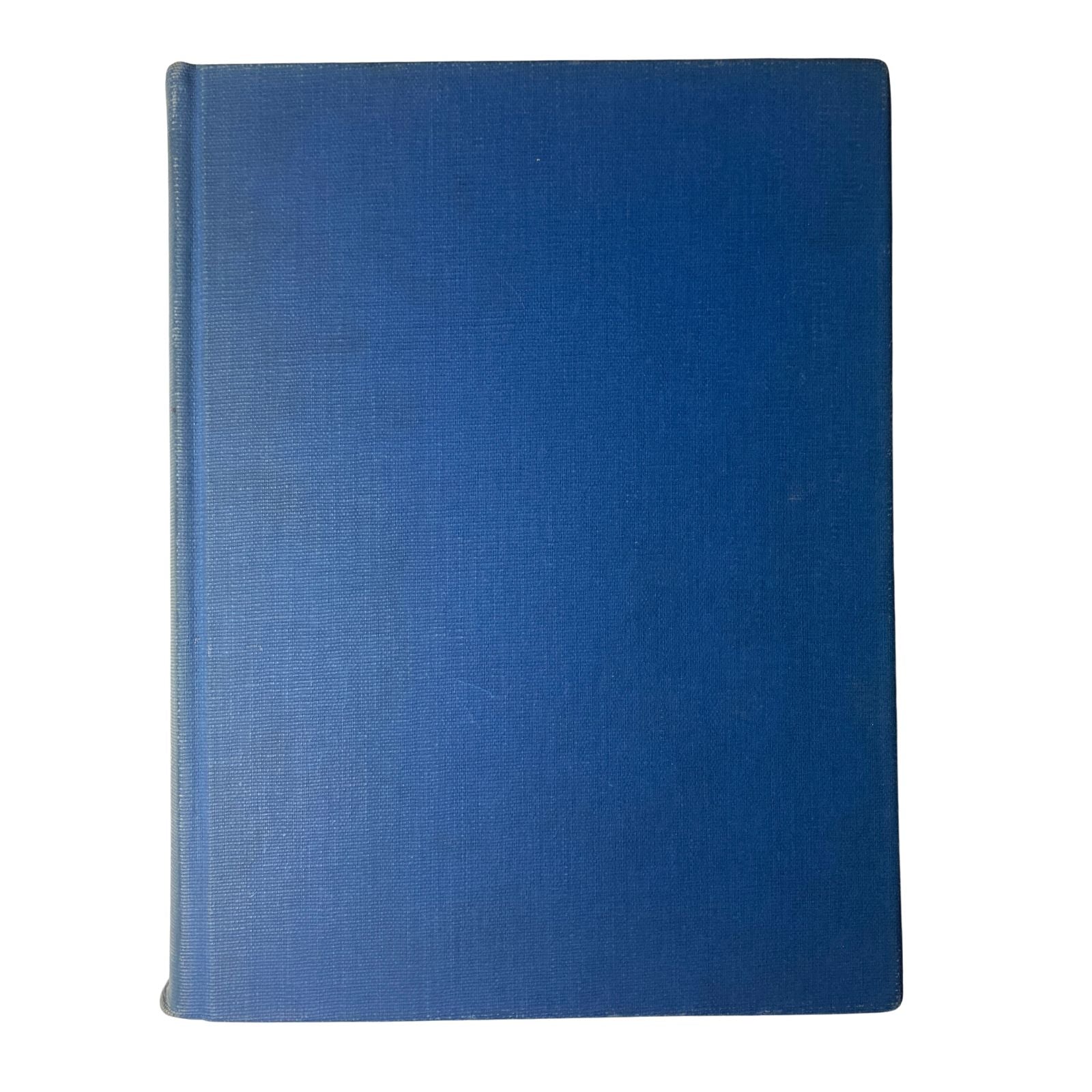 Spine view of the Time Magazine Library Bound Weekly collection, showcasing the blue fabric cover.