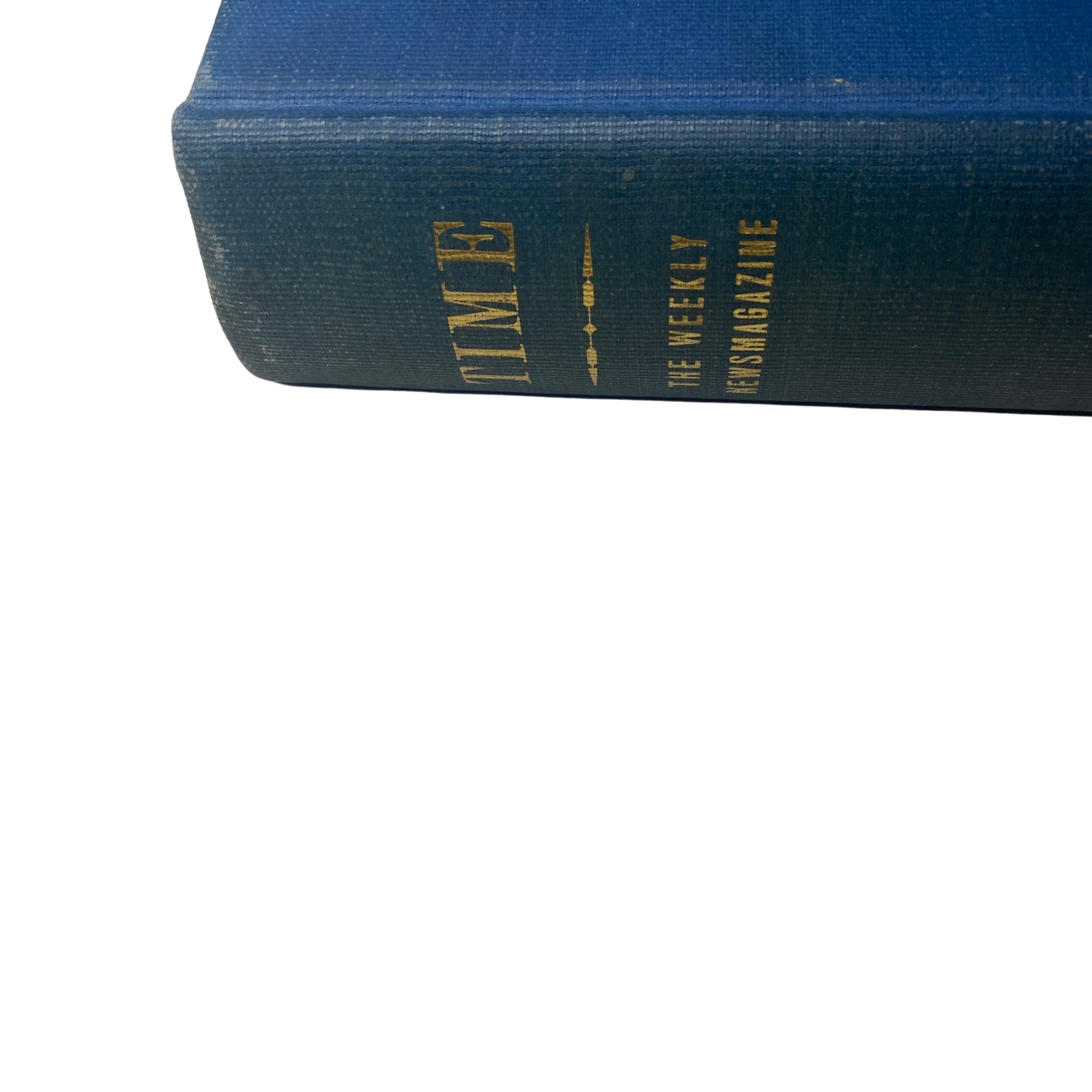 A close-up of the spine of the blue hardcover Time Magazine Library Bound Weekly, featuring the title embossed in gold, representing weekly editions from April 3 to June 26, 1944.