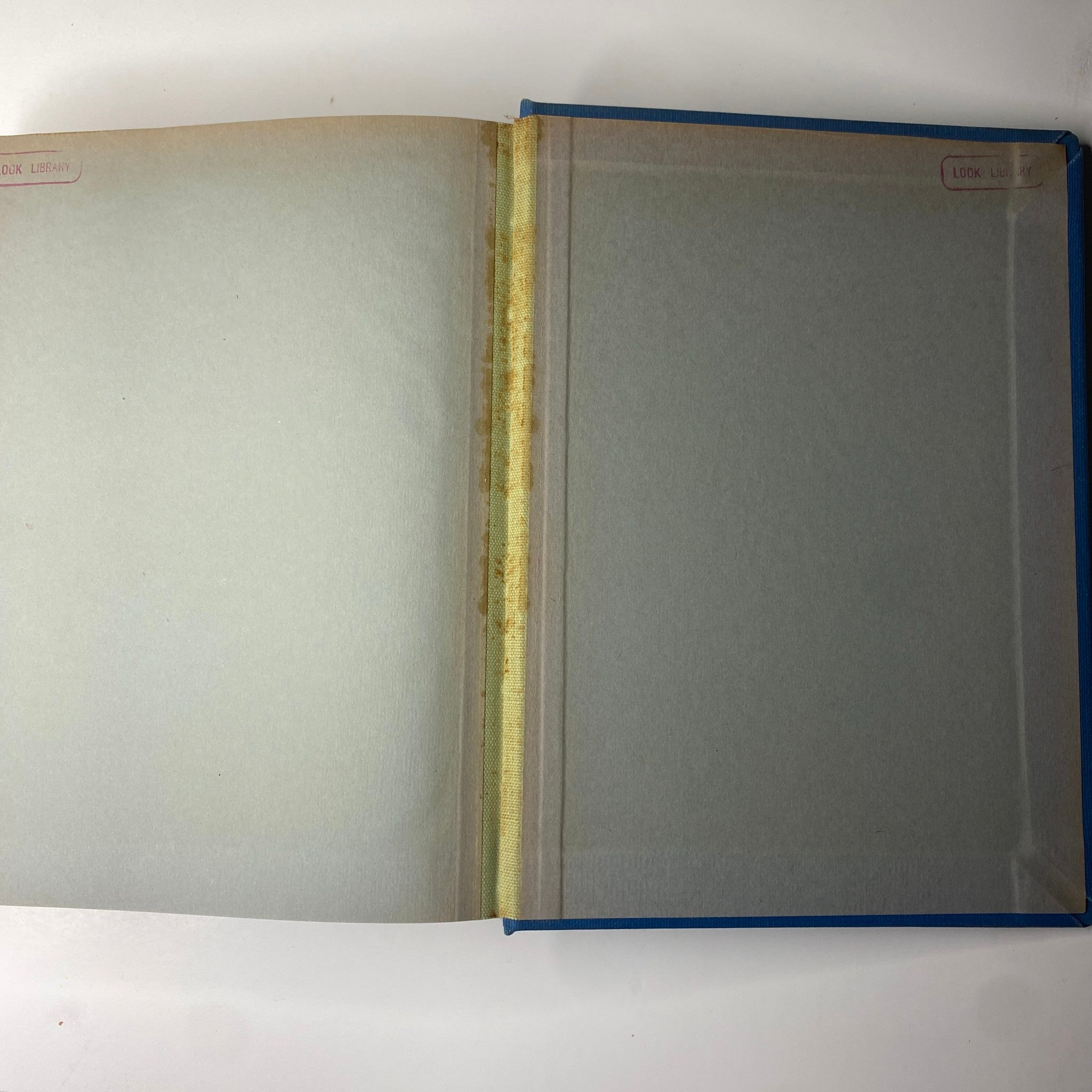 Interior of 'Time Magazine Library Bound Weekly April 3, 1944 - June 26, 1944', showcasing the first page with a library sticker, indicating its history and condition.