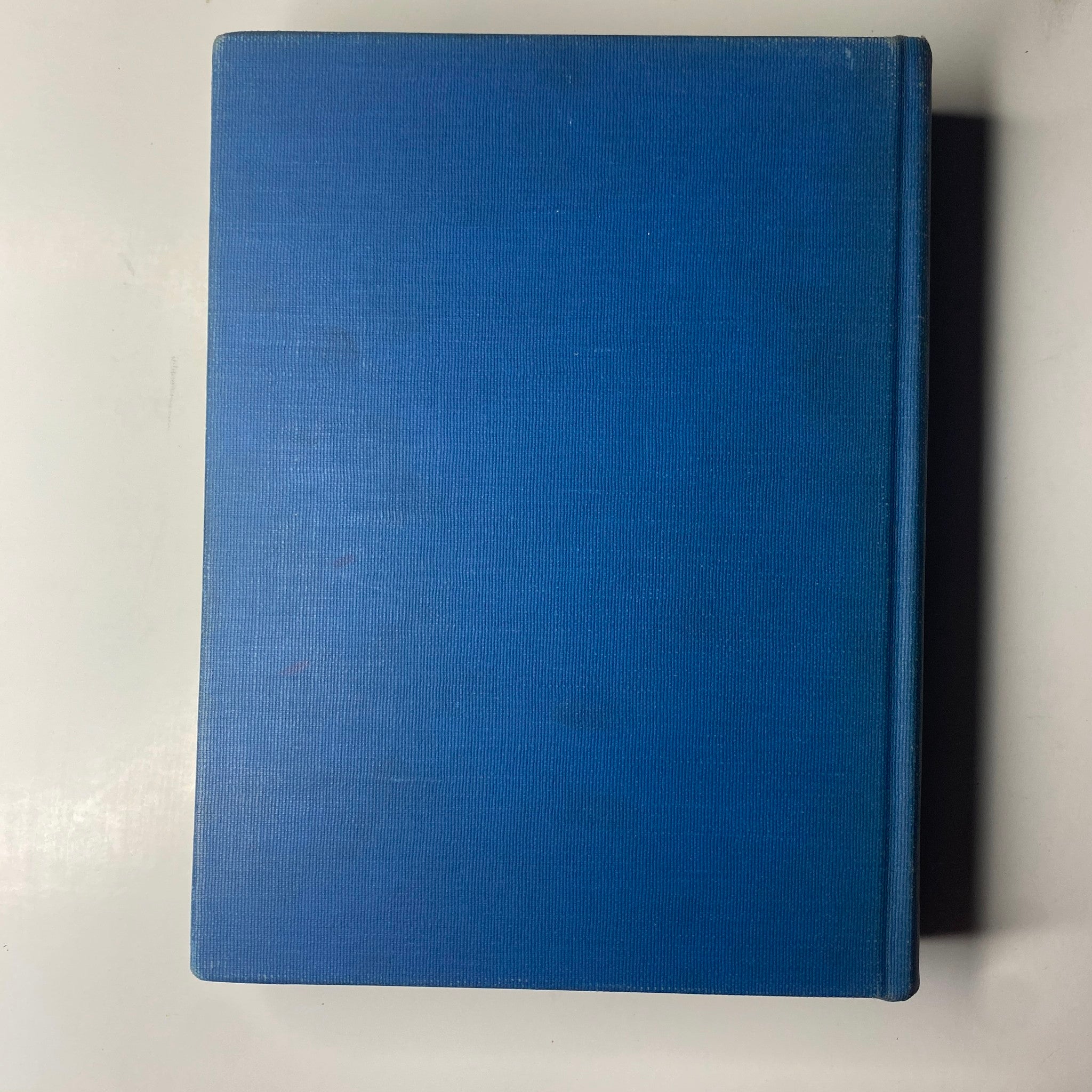 Cover of 'Time Magazine Library Bound Weekly April 3, 1944 - June 26, 1944', featuring a solid blue design, representing the vintage magazine's durable binding and collector's quality.