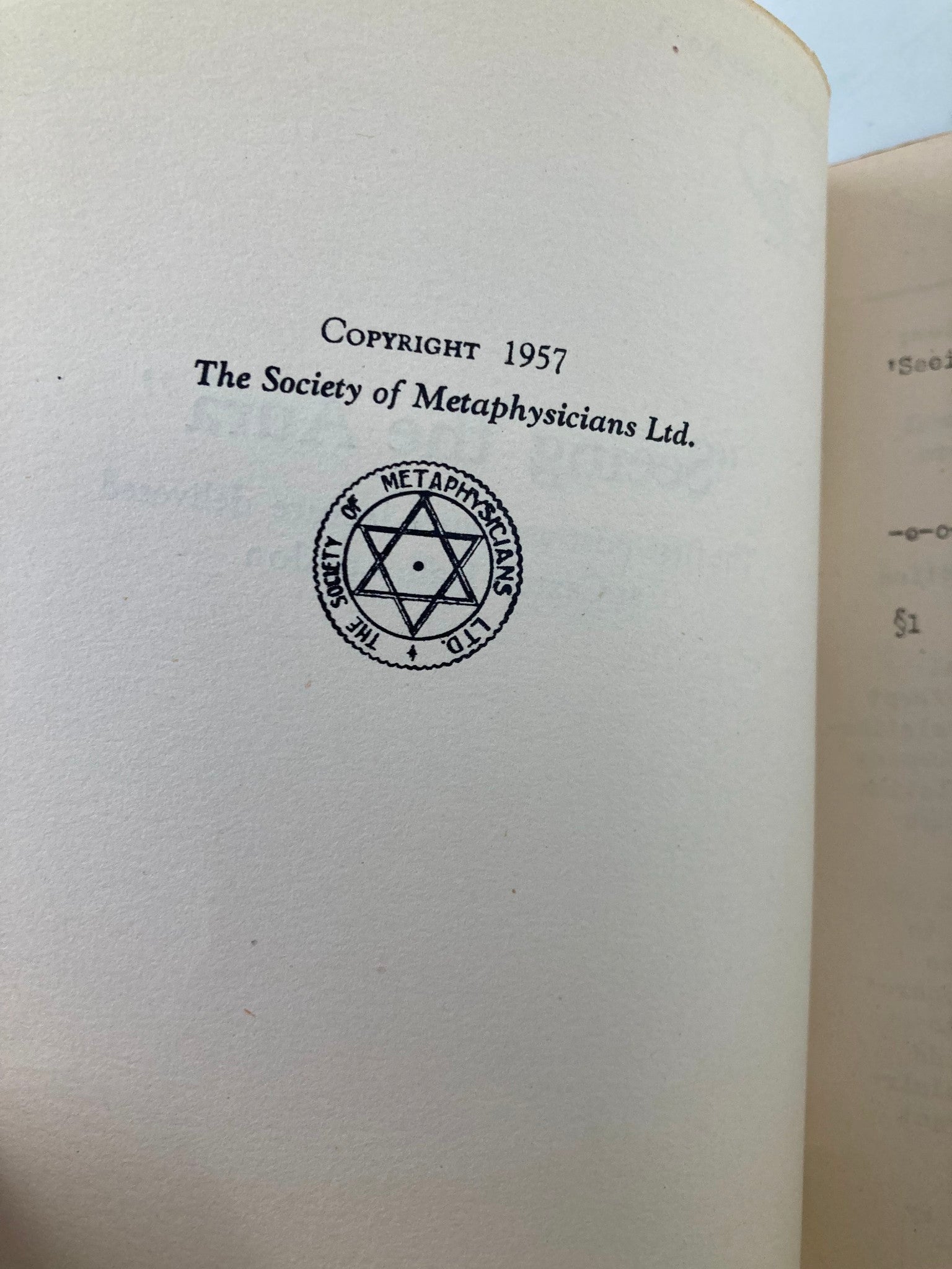 Copyright page of 'Seeing The Aura: The First Post-War Aura Lecture' 1957, featuring The Society of Metaphysicians Ltd. emblem.