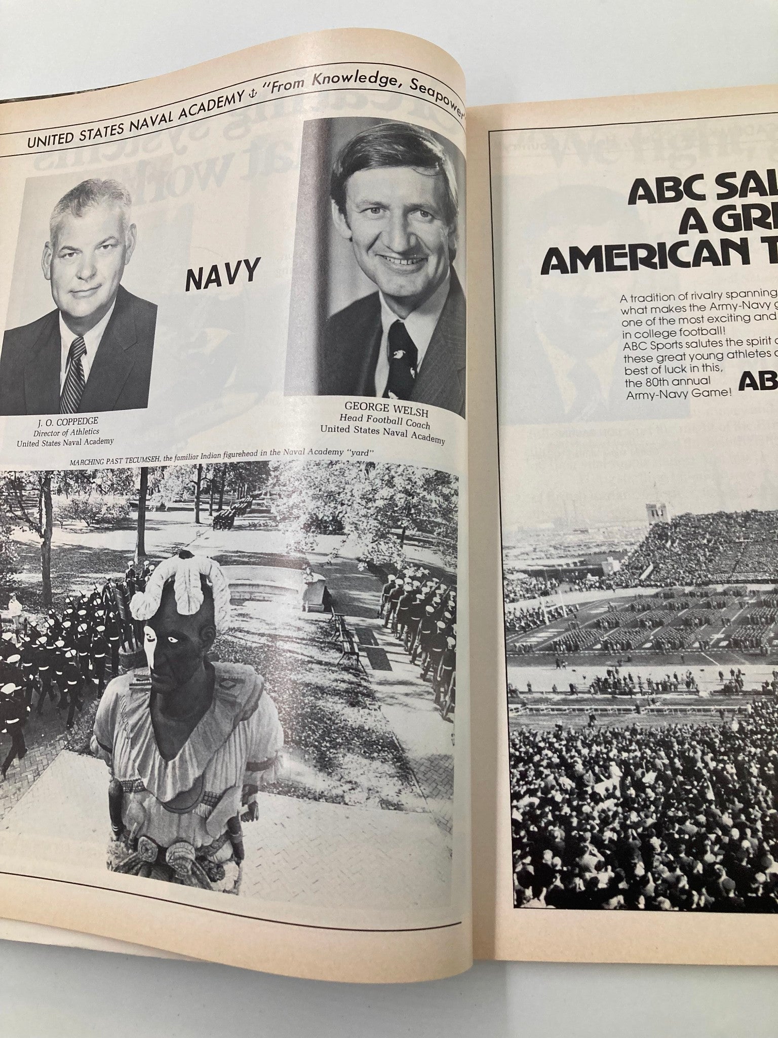 Navy football coaching staff including George Welsh, as seen in the 1979 Football Army-Navy Annual Official Program.