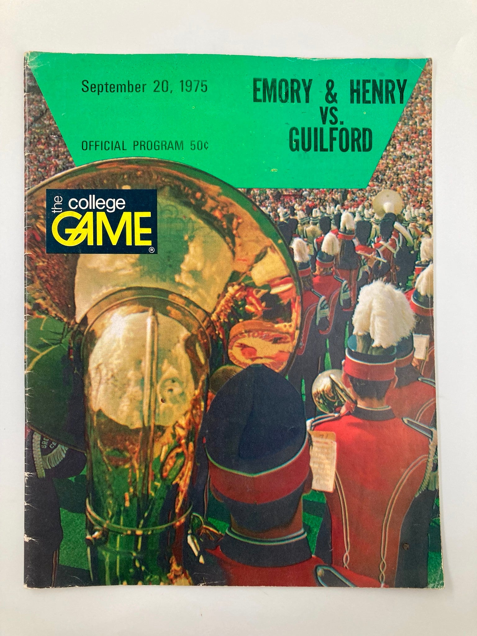 Official program cover for the Emory & Henry vs. Guilford college football game on September 20, 1975, featuring marching band members and vibrant colors.