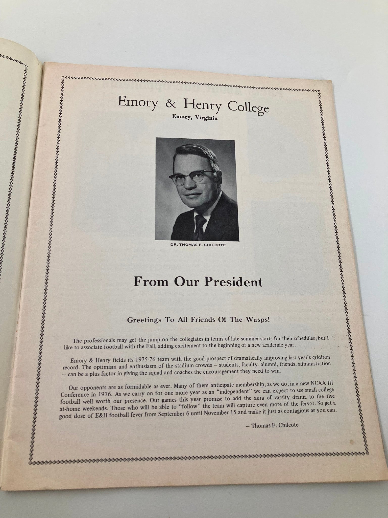 Inside page of the September 20 1975 Emory Henry vs Guilford official program featuring a message from Dr. Thomas F. Chicolte, the president of Emory & Henry College.