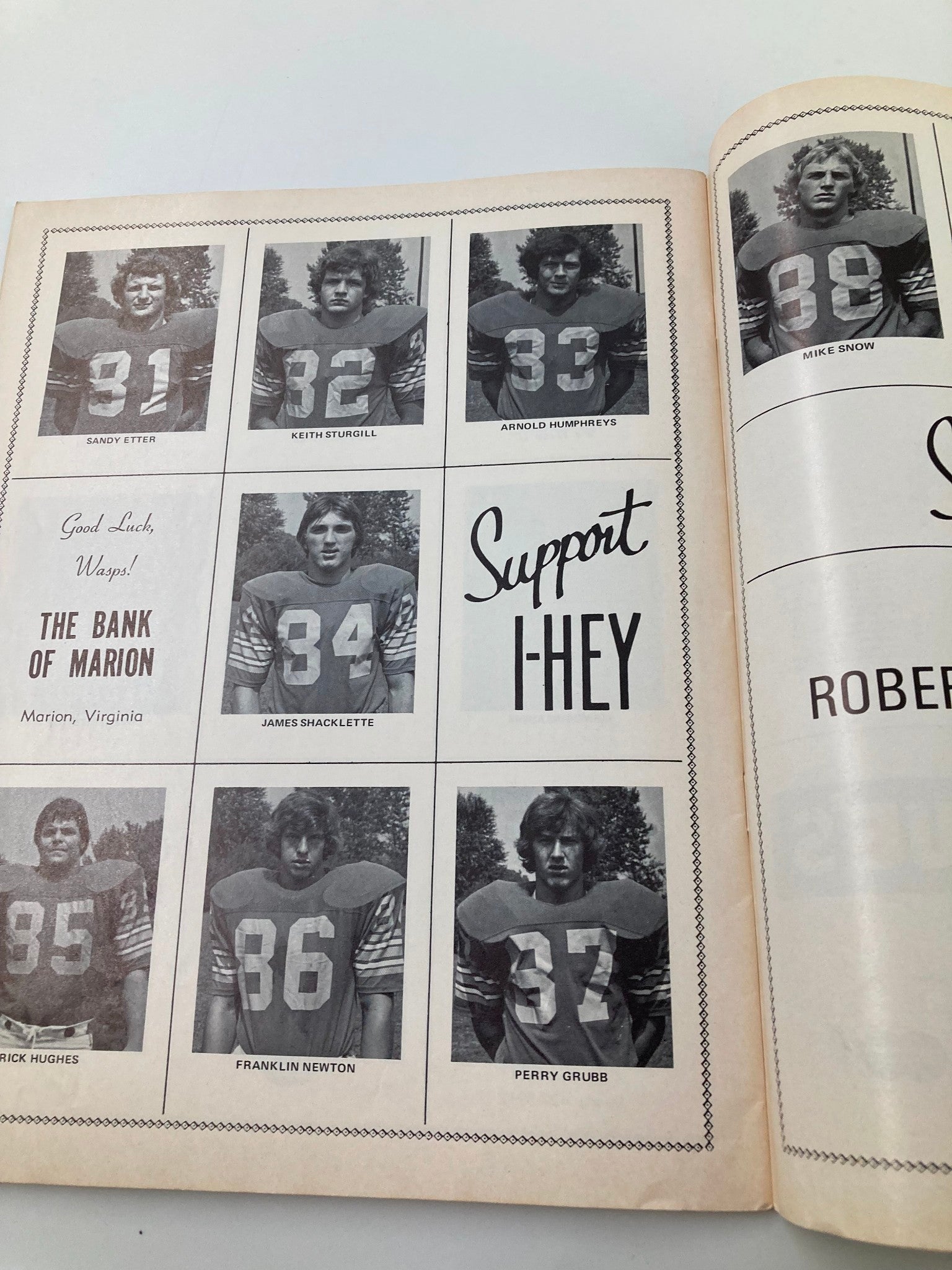 Player headshots featured in the September 20 1975 Emory Henry vs Guilford official program, alongside sponsorship notices.